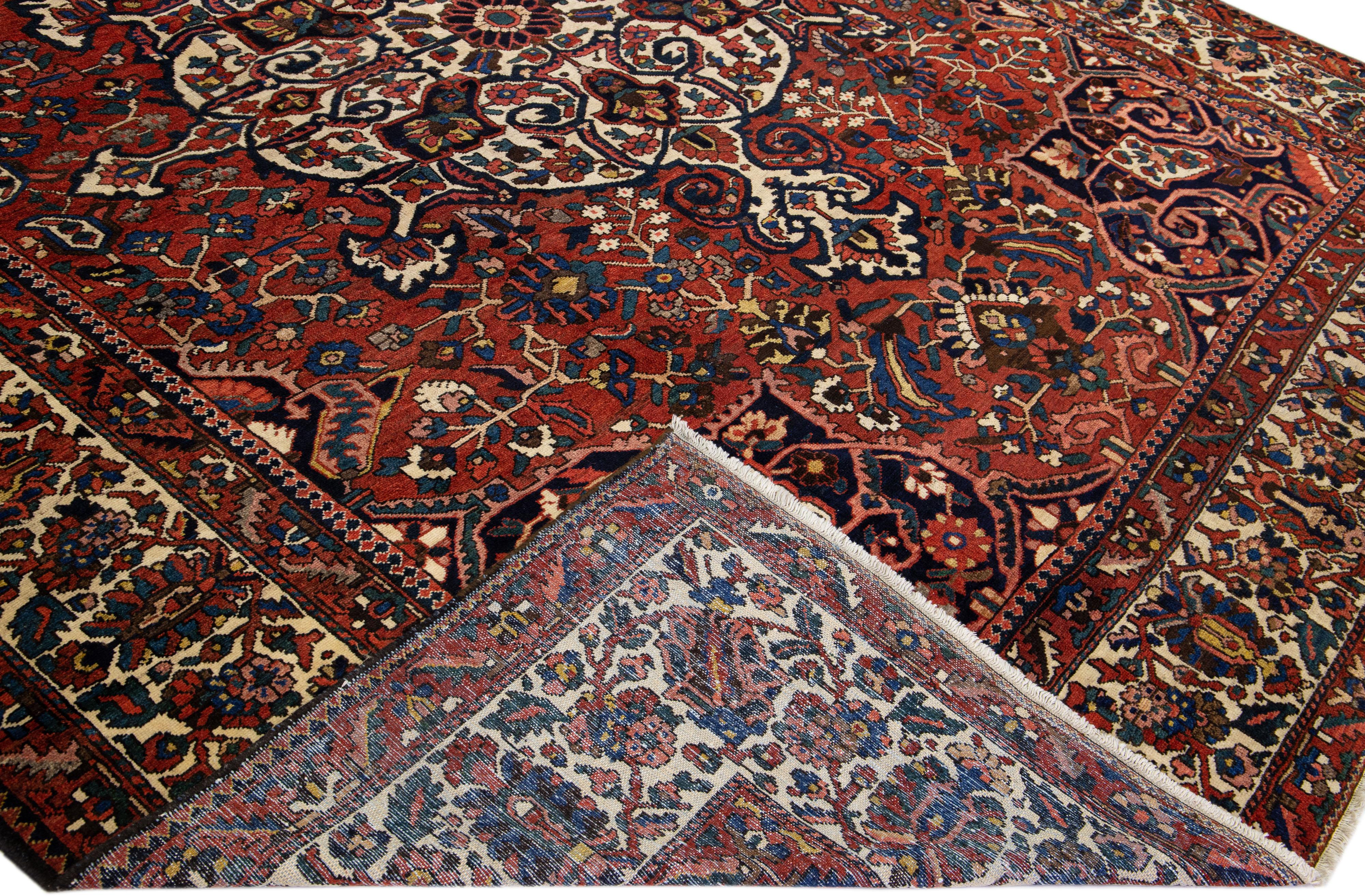 Red Handmade Antique Persian Bakhtiari Rosette Wool Rug  For Sale 1