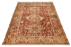 Red Handmade Antique Wool Rug Persian Heriz Featuring a Medallion Motif
