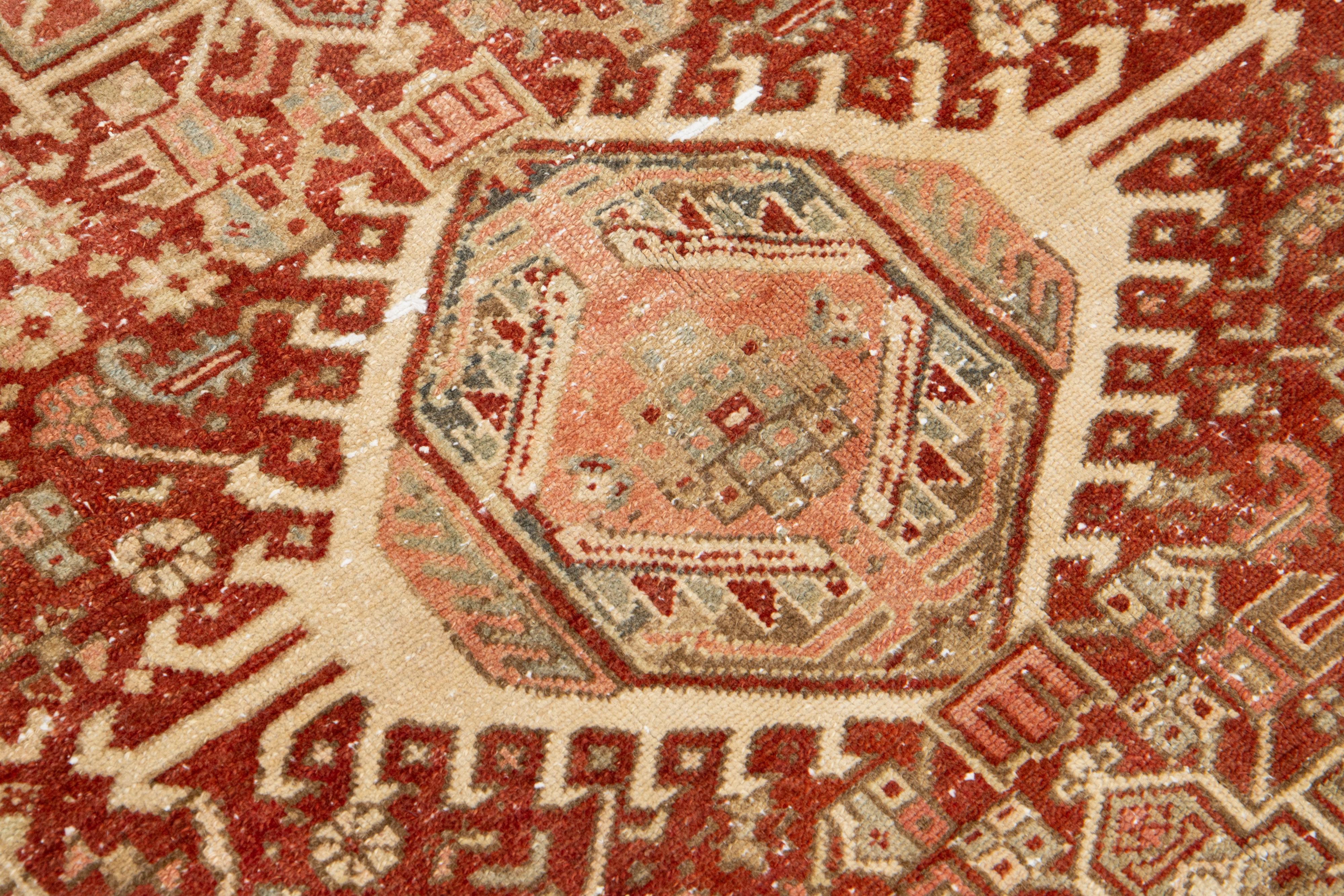 Red Handmade Antique Wool Rug Persian Heriz Featuring a Medallion Motif  For Sale 1