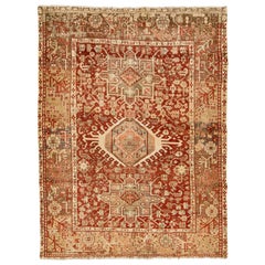 Red Handmade Antique Wool Rug Persian Heriz Featuring a Medallion Motif