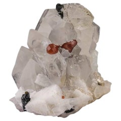Crystals de grenats Hassonite rouges sur quartz avec cercle du Pakistan