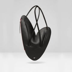 Red Heart black leather backpack / shoulder bag