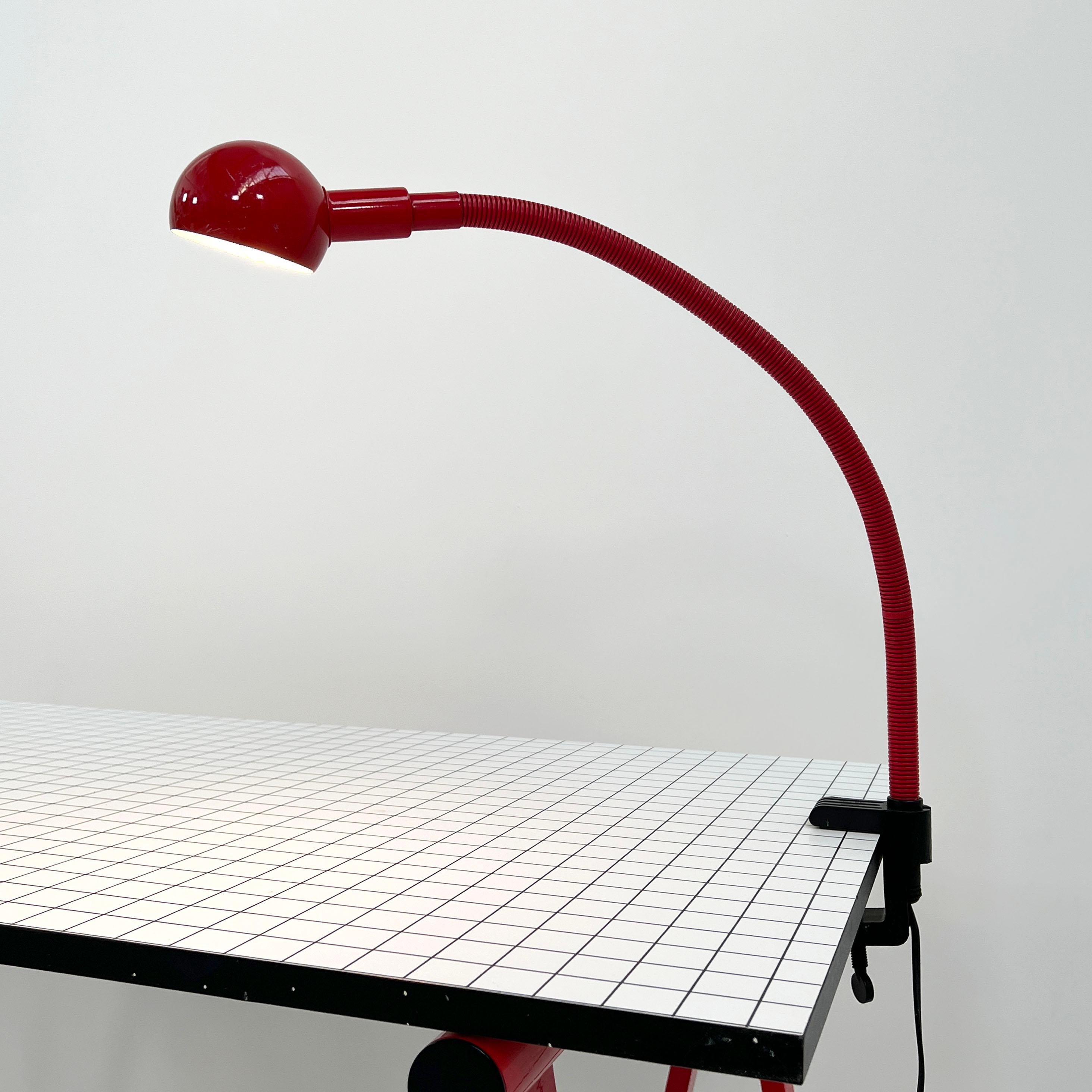 Red Hebi desk lamp by Isao Hosoe for Valenti, 1970s
Designer - Isao Hosoe 
Producer - Valenti
Model - Hebi Desk Lamp
Design Period - Seventies
Measurements - width 27 cm x depth 27 cm x height 40 cm
Materials - Metal, Plastic
Color -