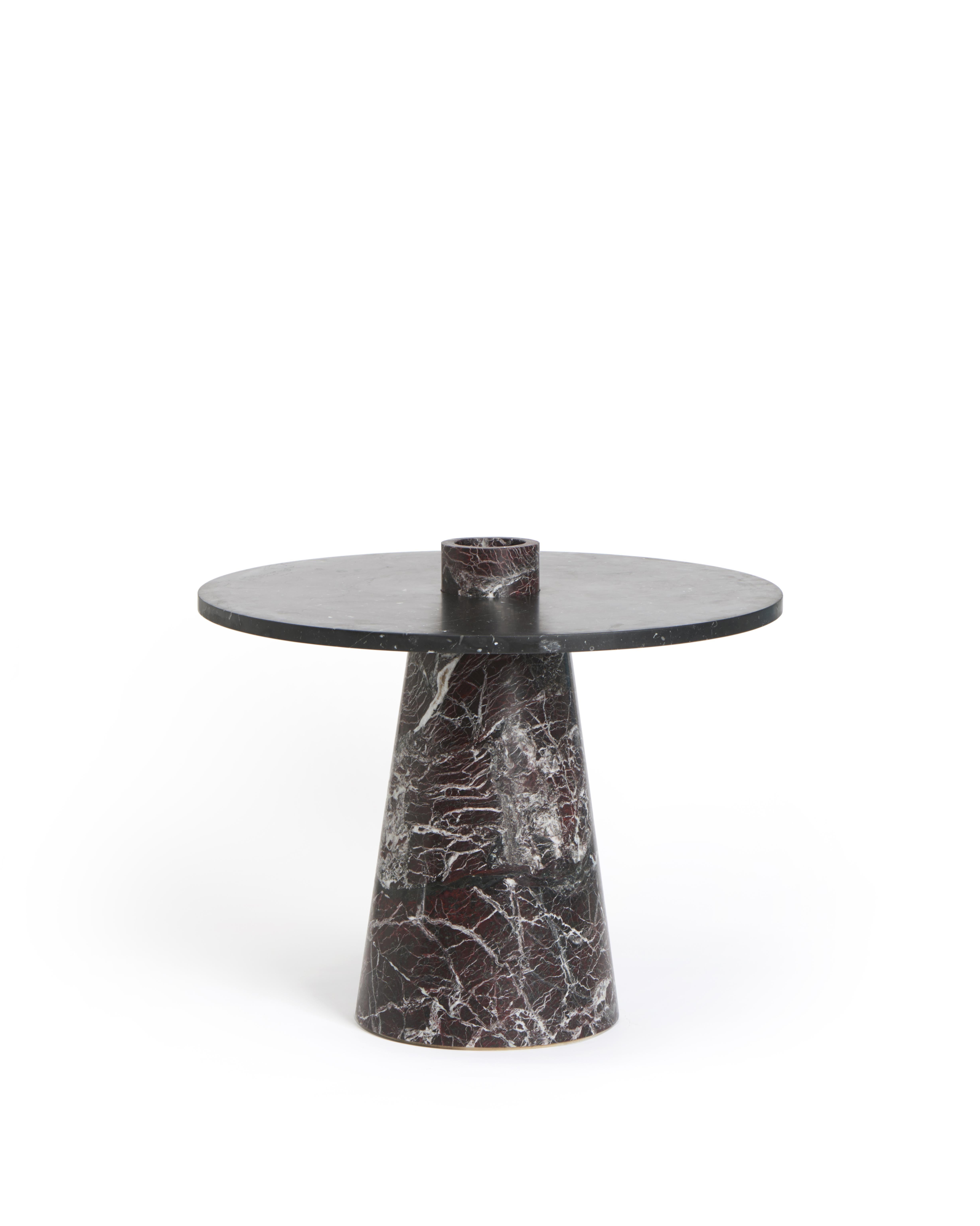 Red inside out table set by Karen Chekerdjian
Dimensions: 58 x 32 x 70 cm
Materials: Rosso Levanto, Nero Marquinia
Includes: Fruit bowl, candle holder, flower vase in red marble

Karen’s trajectory into designing was unsystematic, comprised of