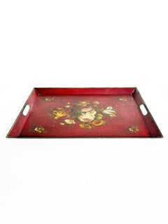 Red iron tray with floral motif, France, 1940