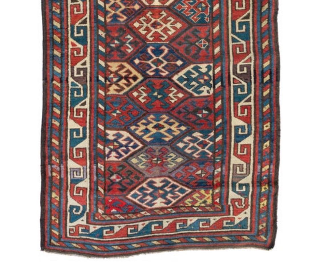 Hand-Woven Red Ivory Navy Blue Tribal Geometric Caucasian Kazak Rug, circa 1880-1900 For Sale