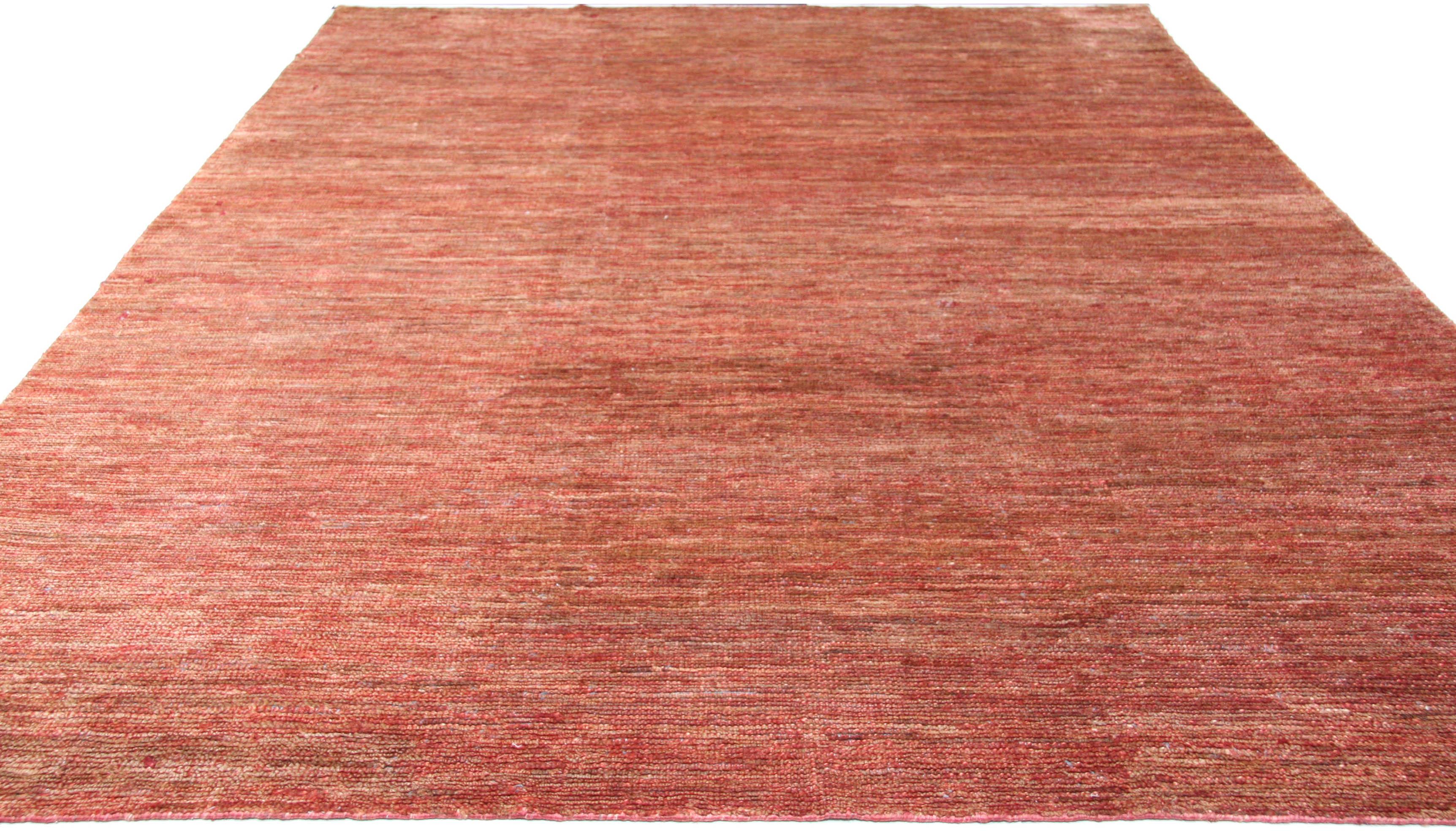 A closer look at this natural jute rug reveals a surprising range of red, brown, cream and other warm tones. Powerful but not distracting. Wonderfully soft and best suited for low to medium traffic areas. 

Hand knotted in India. Made using