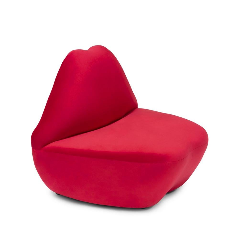 Armchair Red Kiss with wooden structure, 
upholstered and covered with red fabric.
Also available on request with pink fabric,
or dark red fabric, or black fabric or with
blue fabric.
