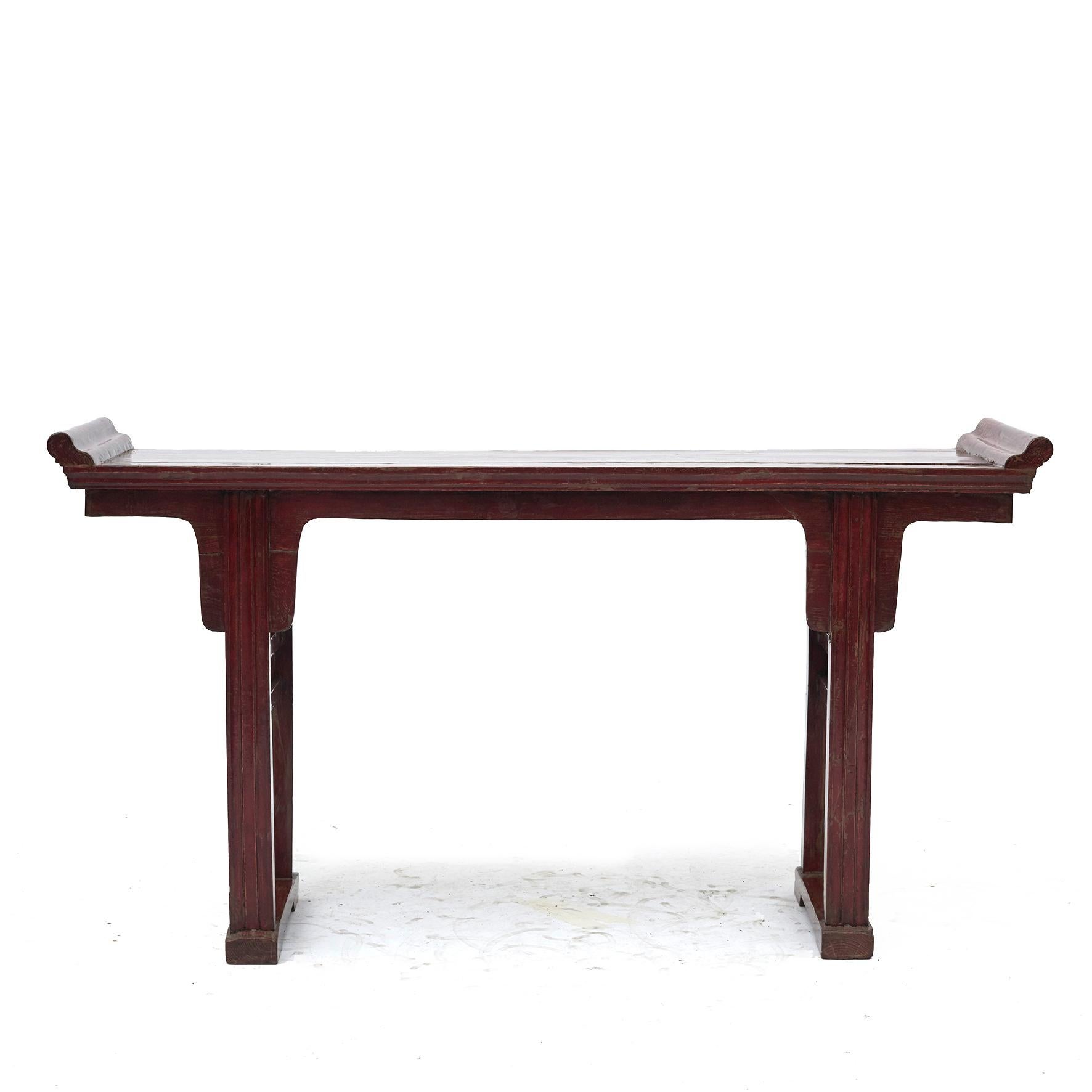 Altar table/console table, original red lacquer with natural age-related patina, highlighted by a clear lacquer surface finish. Front side with profiled legs. Table top with 'wings' console tables with wings are often called altar tables.
Most were