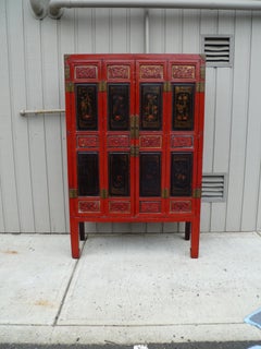 Red Lacquer Armoire with Relief Carving & Gilt Motif