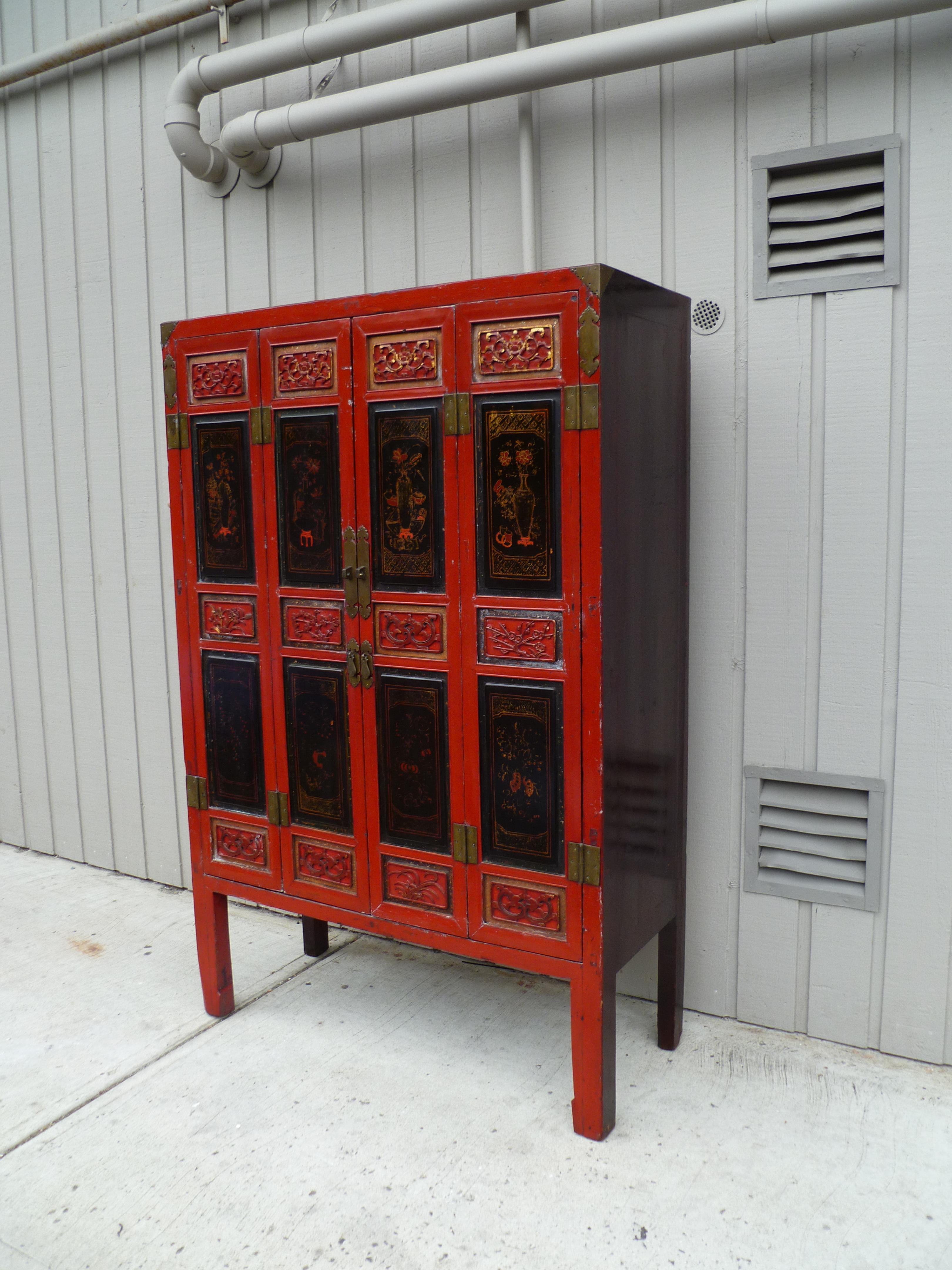 Red Lacquer Armoire with Relief Carving & Gilt Motif In Good Condition For Sale In Greenwich, CT