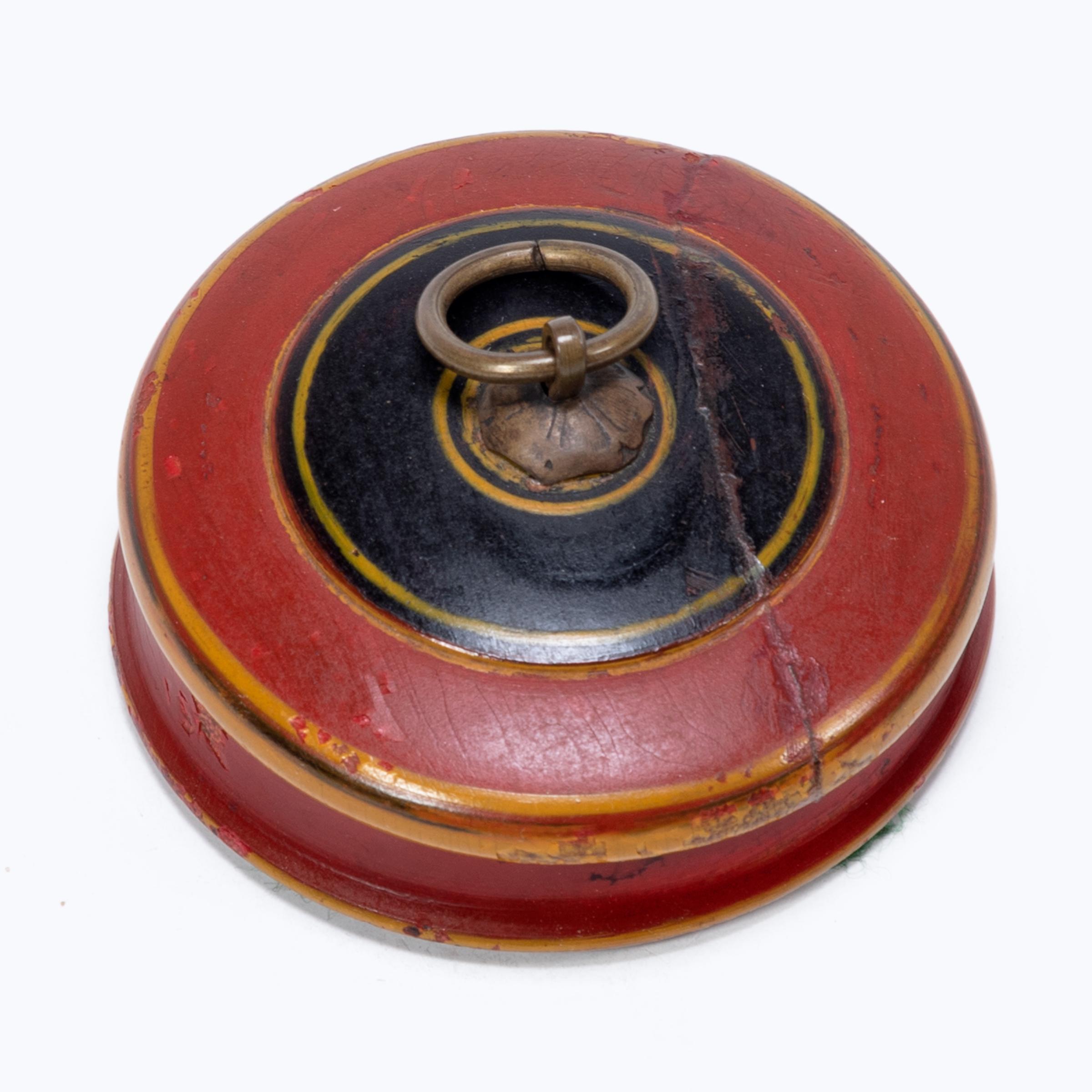 In many southeast Asian cultures, offering guests a betel quid to chew was the fundamental symbol of hospitality. A blend of leaves, nuts, seasonings, and sometimes tobacco, betel was kept in finely worked and decorated boxes. This round betel box