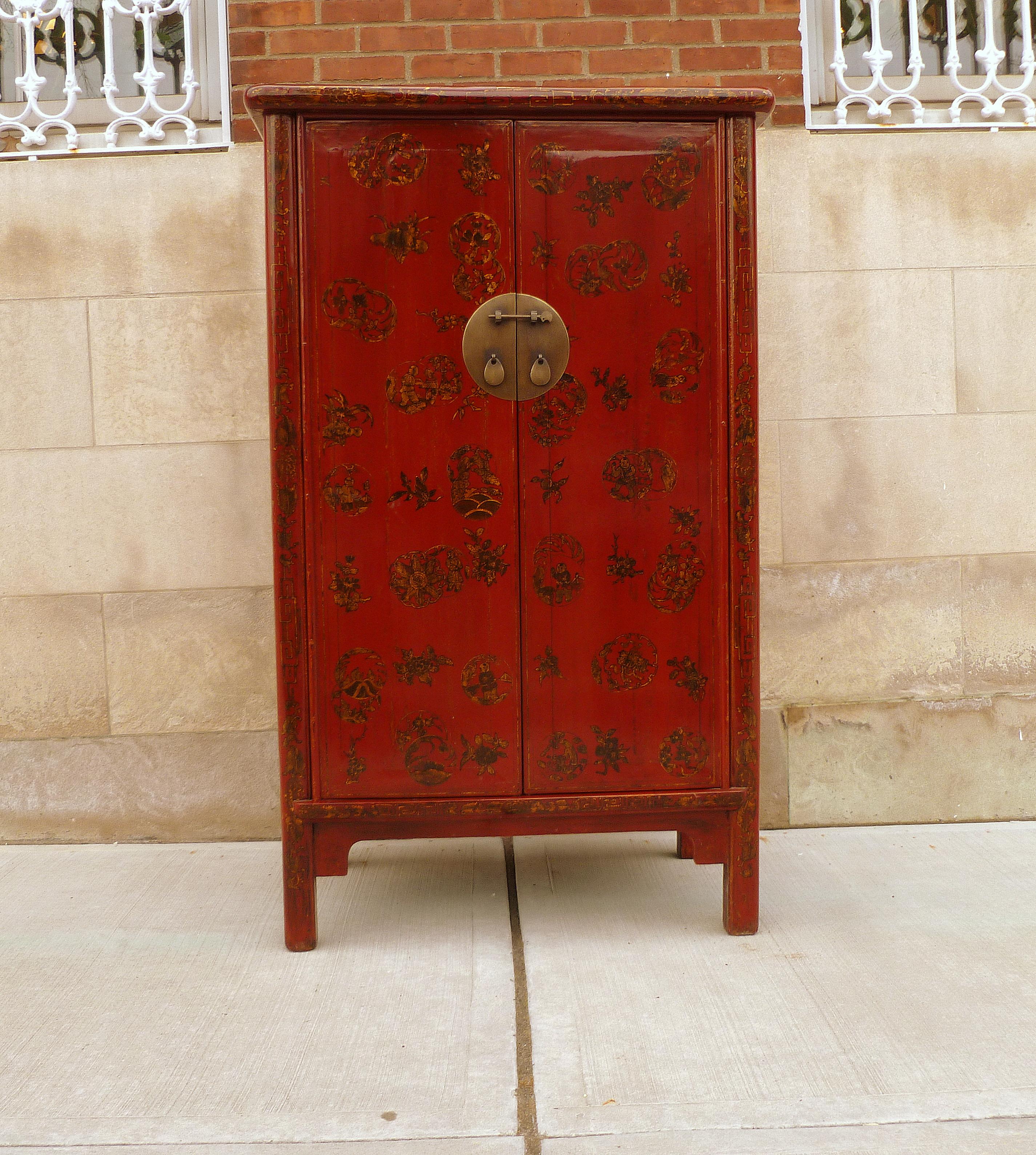 Red lacquer cabinet with gilt motif with inside two drawers shelf and bottom space. We carry fine quality furniture with elegant finished and has been appeared many times in 