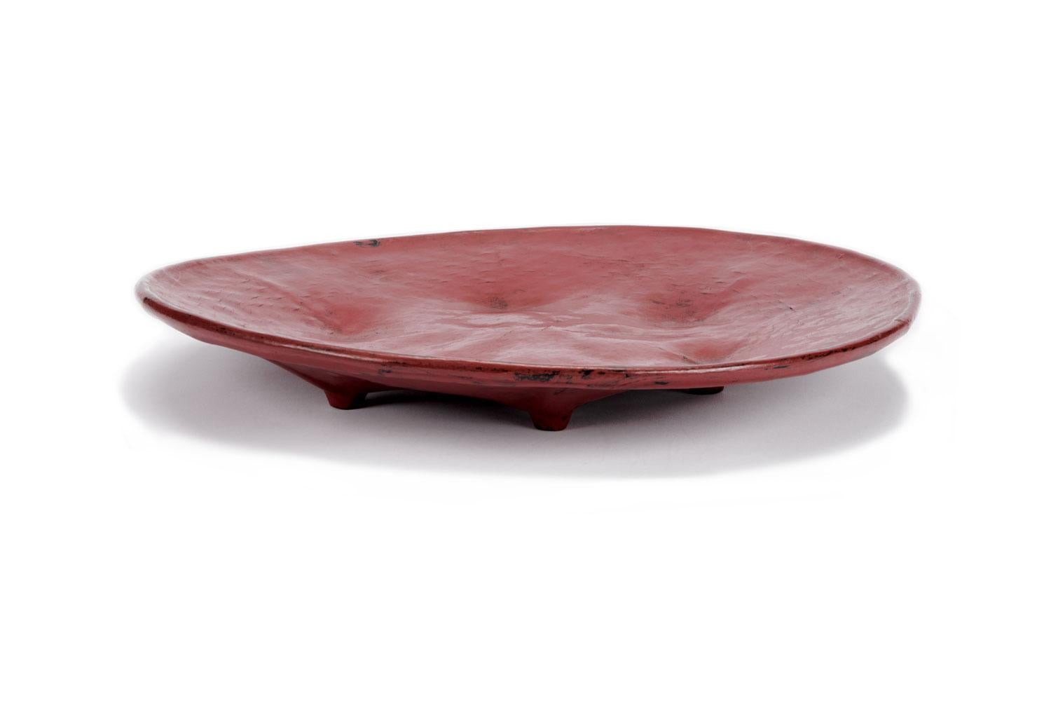 This large lacquer round tray is Burmese (Myanmar) and from the mid-20th century. Tray is slightly irregular shape with a rounded bottom with six 1/2