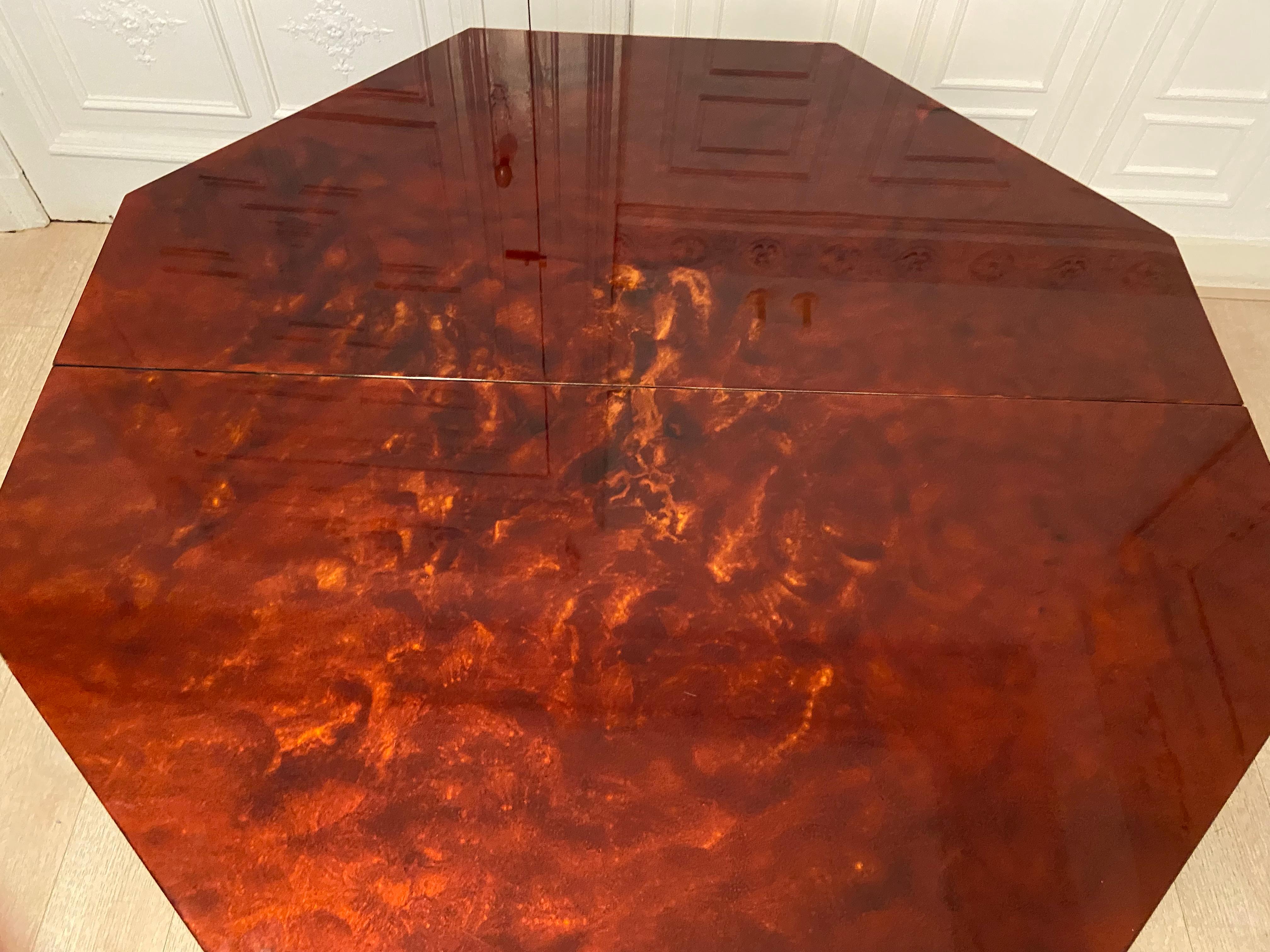 Wood Red lacquered dining table and gold dust, 1970s For Sale