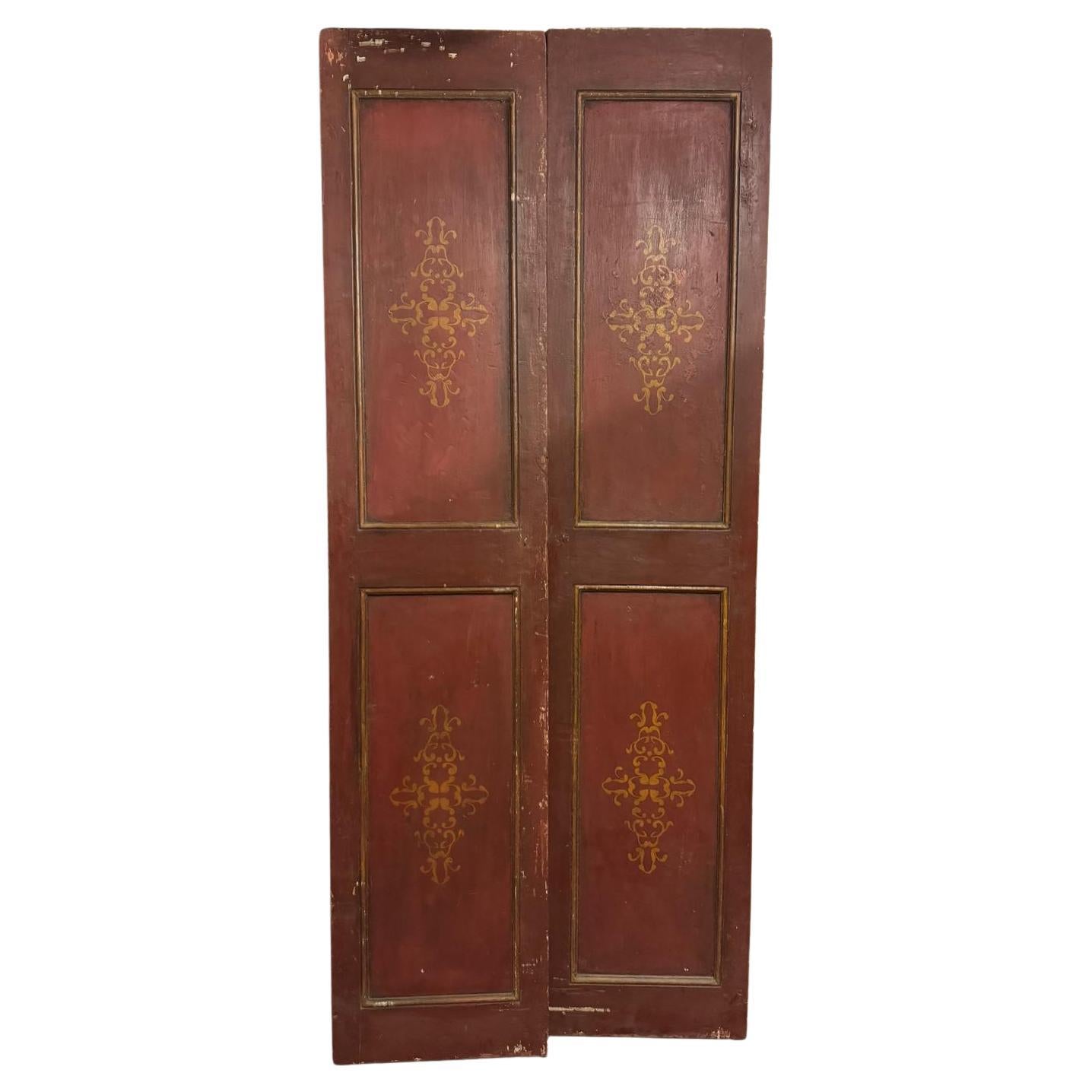 Red lacquered double-wing door, with golden decorations on the panels, Italy For Sale