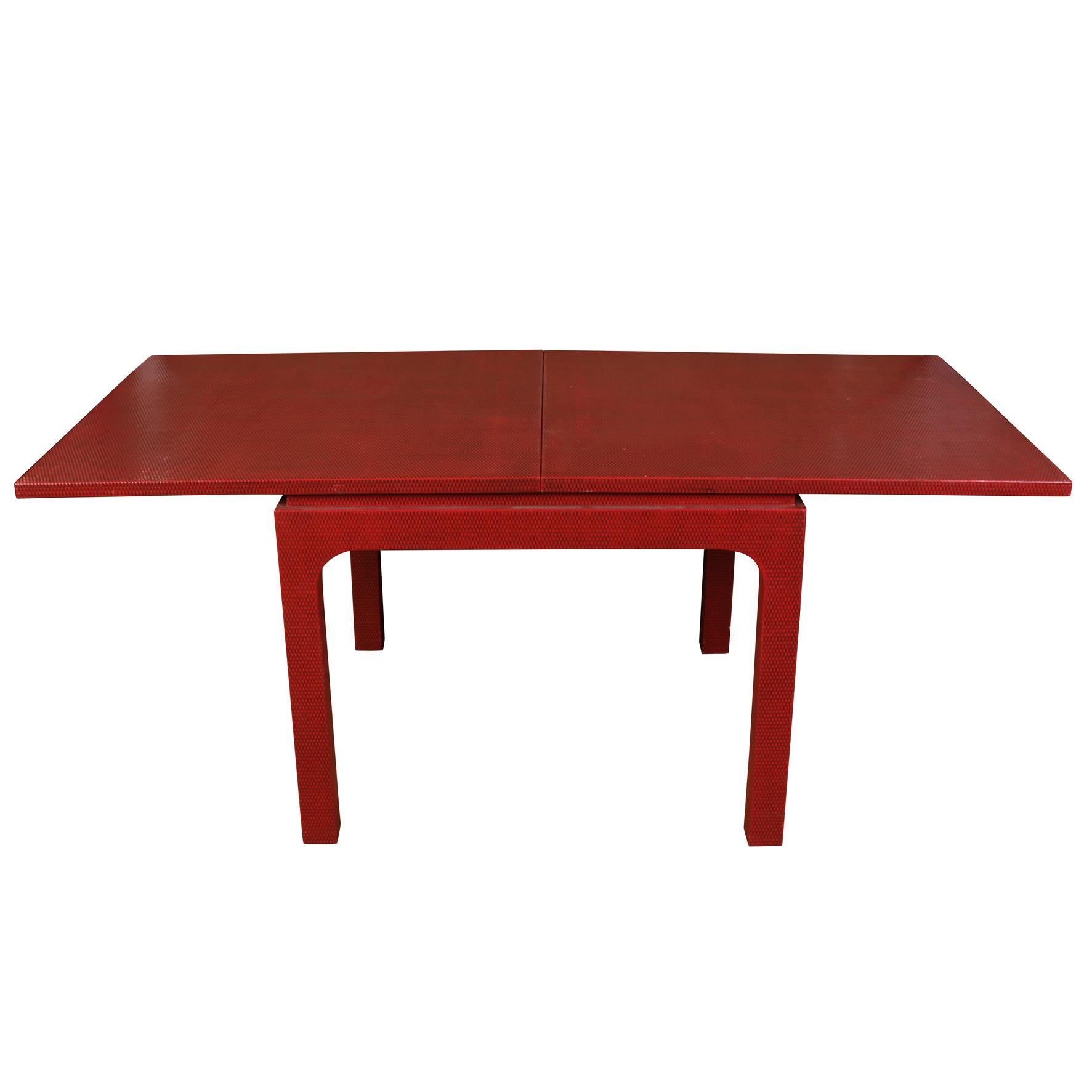Red lacquered grasscloth games table with top that expands to a 72.25