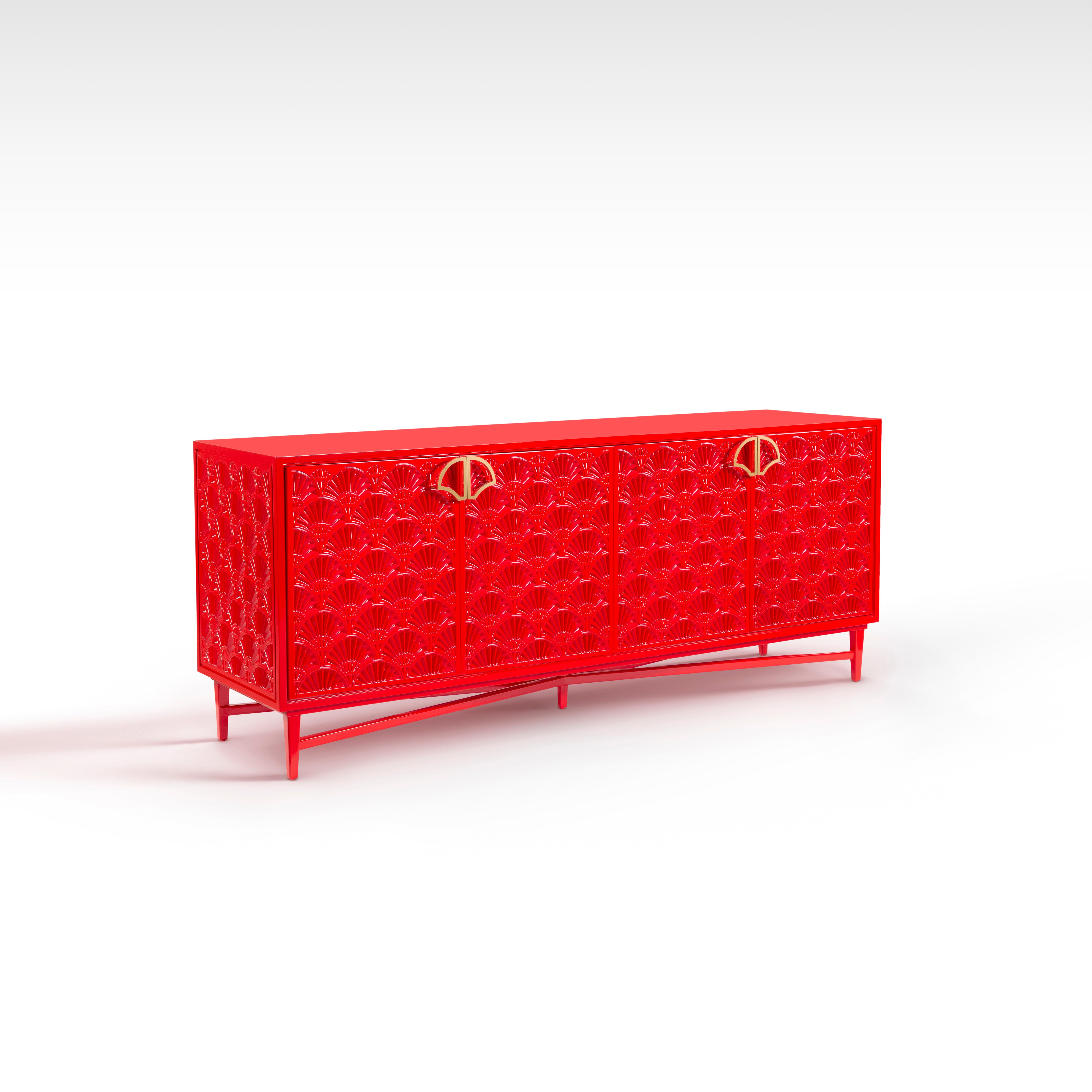 Red Lacquered Buffet with Modern Lotus Pattern and Brass Lotus Handle.
A contemporary twist to the beautiful lotus motif inspired by our Pharaonic heritage. The design of the buffet is comprised of a recurring pattern of the ancient holistic symbol