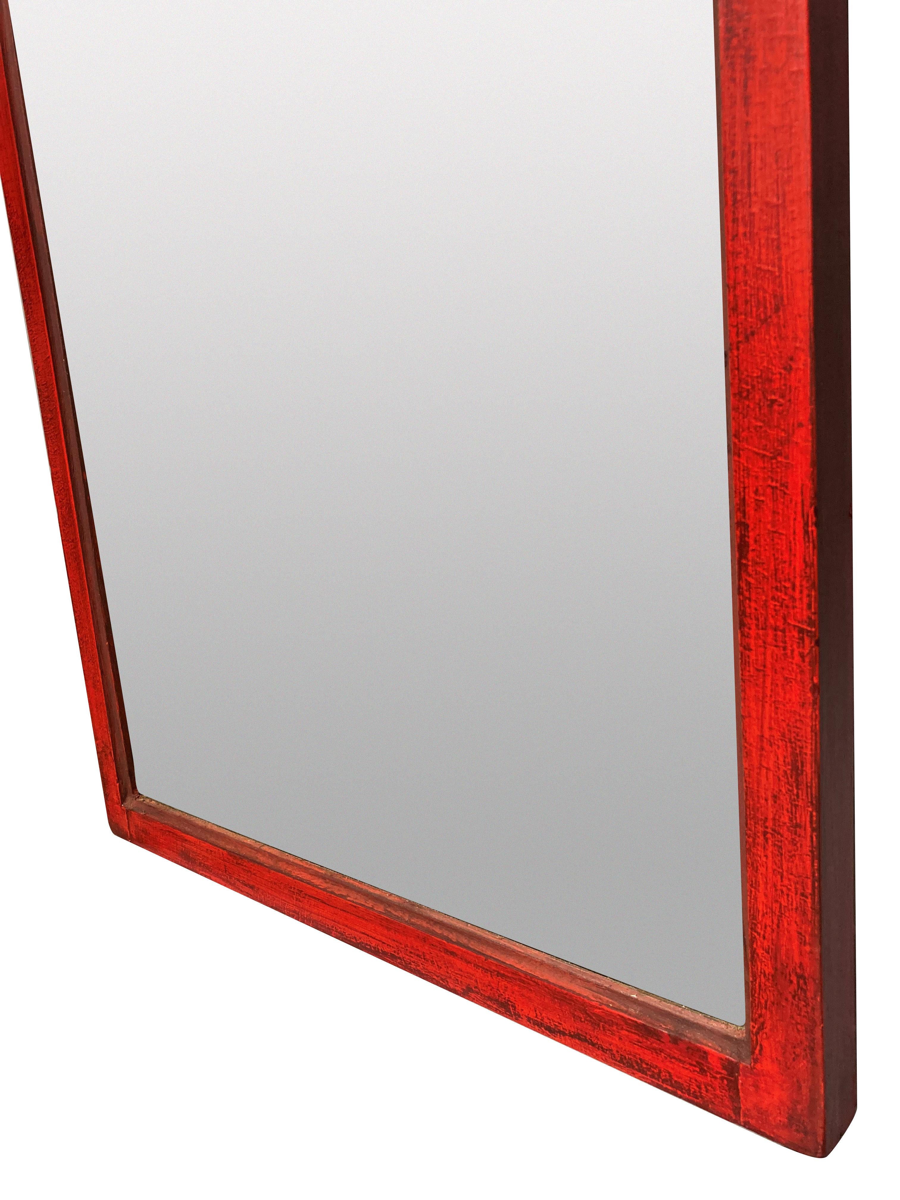 An English Queen Anne style red lacquered slender mirror, which makes up a matched pair with a seperate listing.