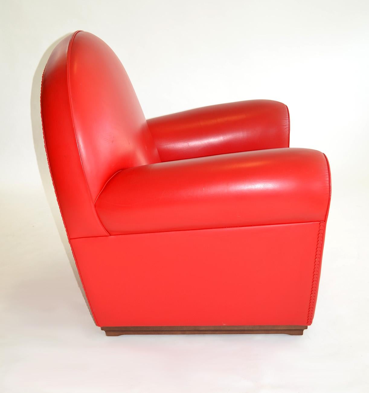 red leather chair with ottoman