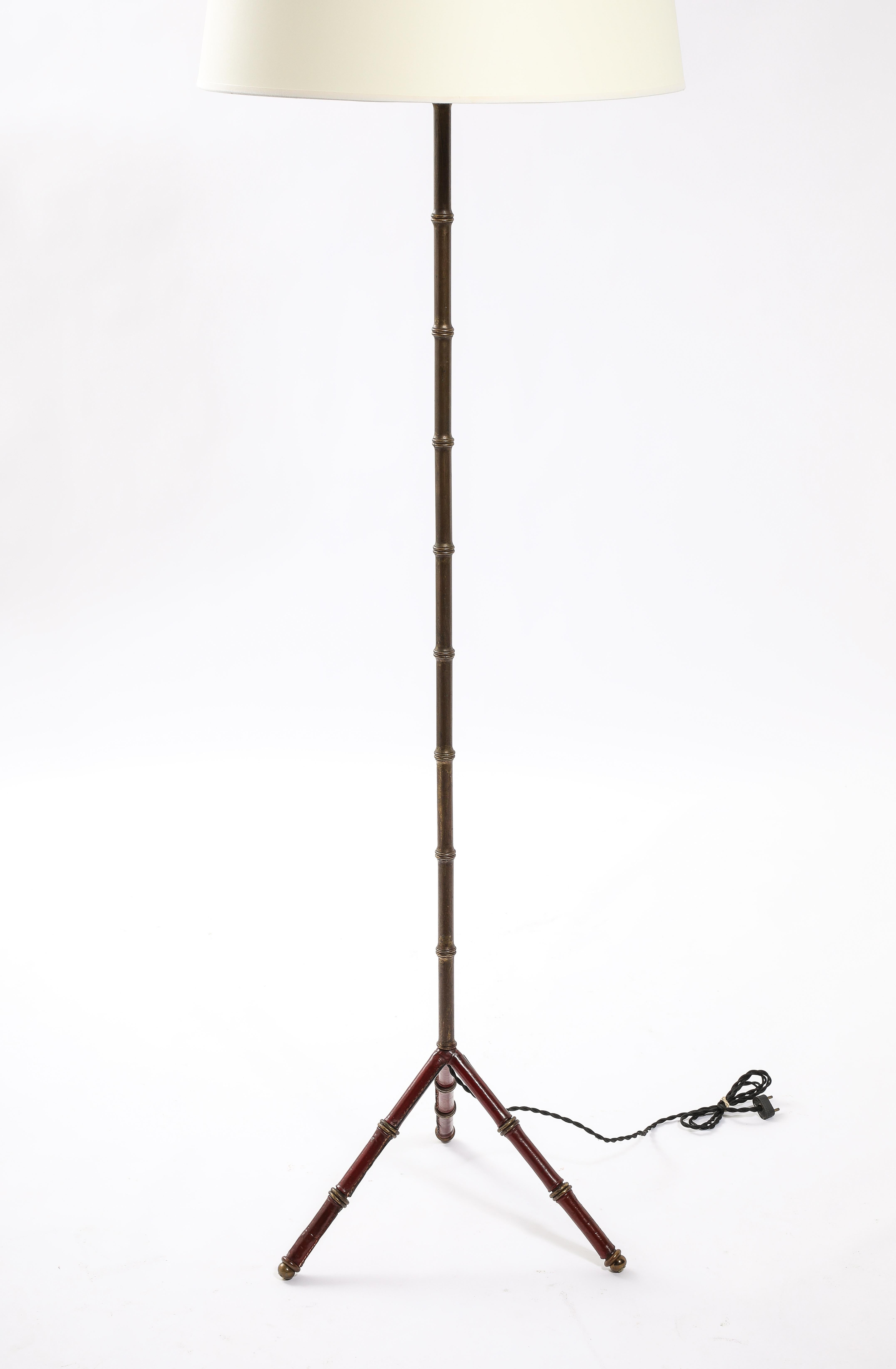 Modern Red Leather & Brass Faux Bamboo Jacques Adnet Floor lamp, France 1950's For Sale