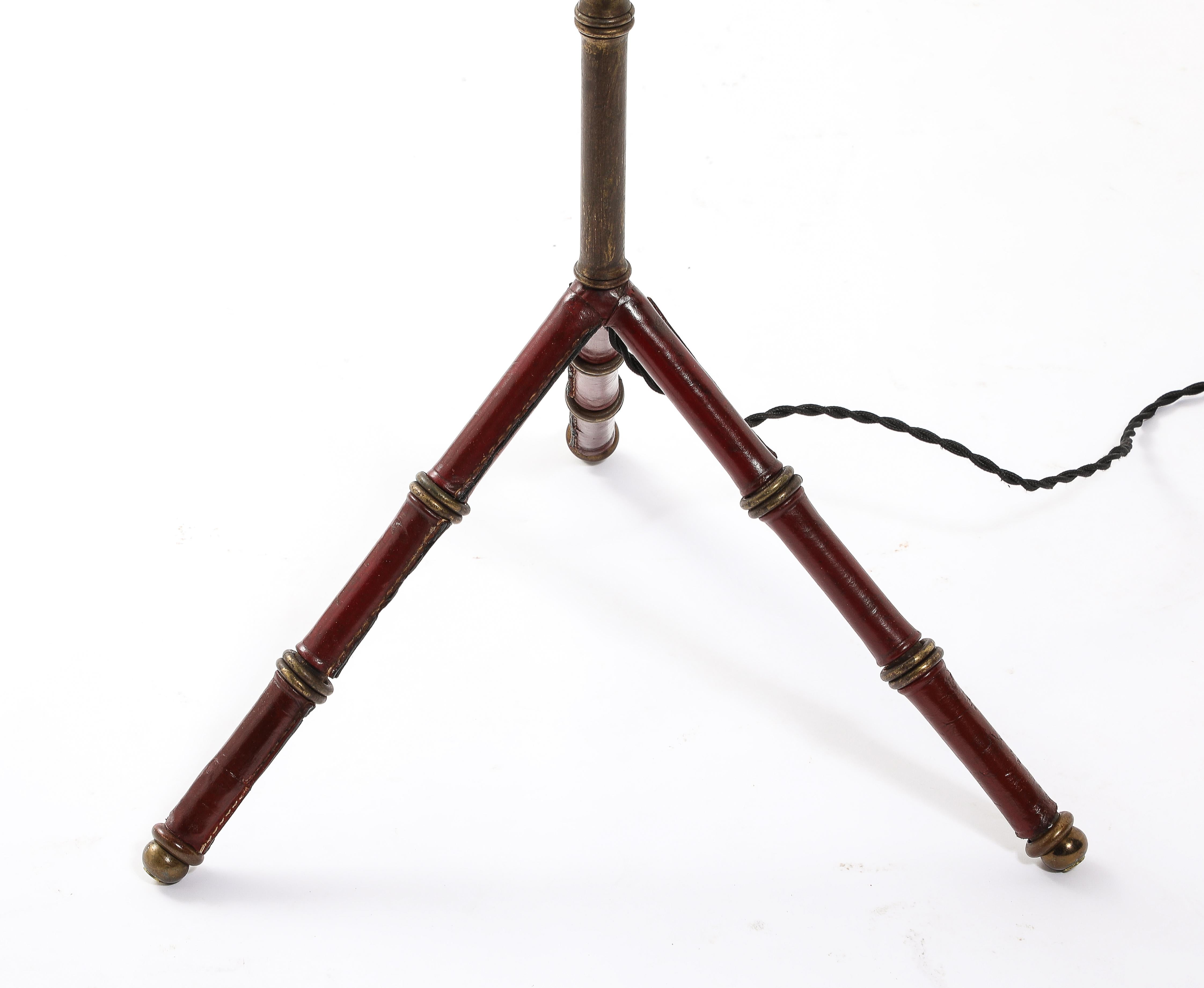 French Red Leather & Brass Faux Bamboo Jacques Adnet Floor lamp, France 1950's For Sale