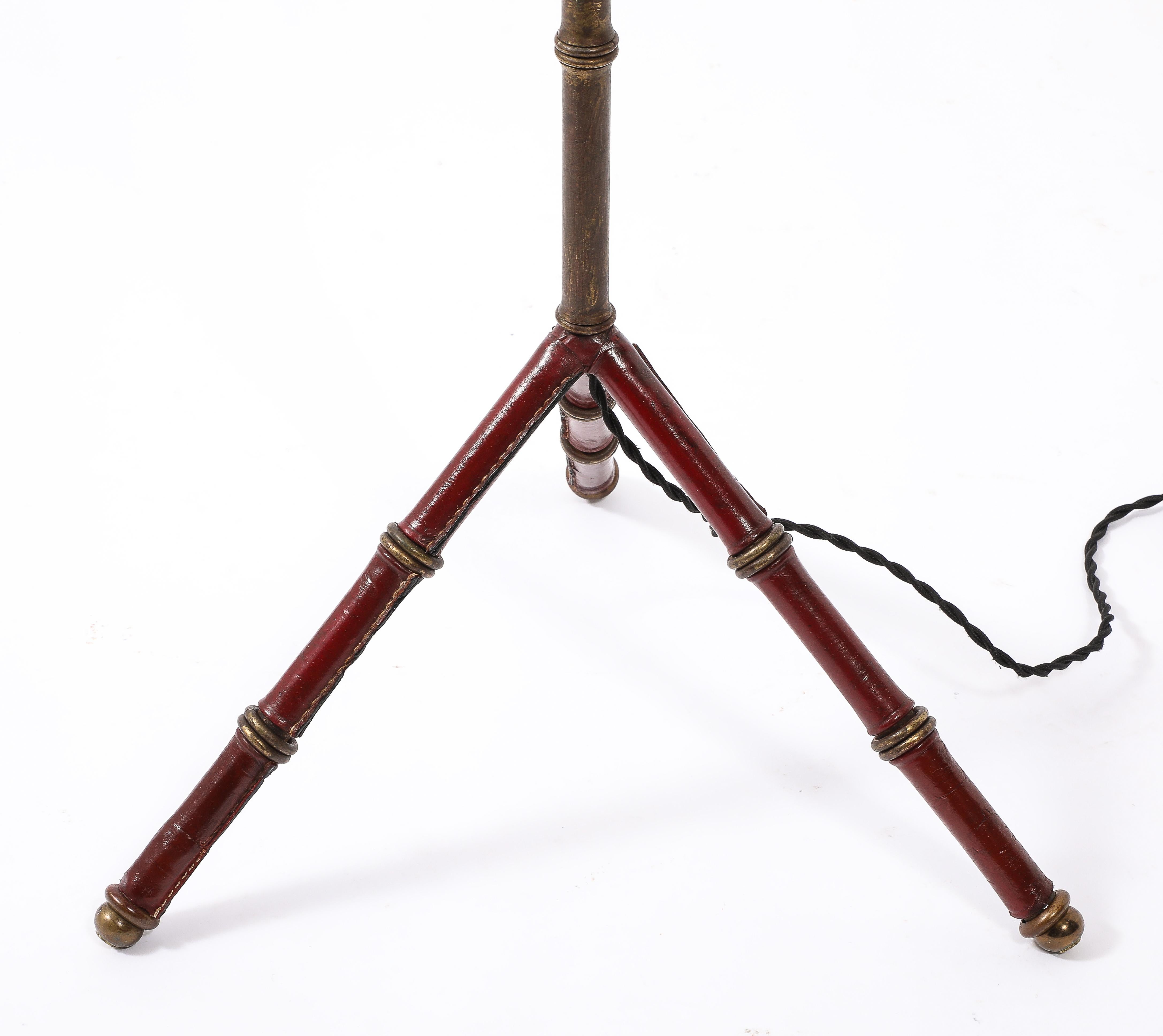 20th Century Red Leather & Brass Faux Bamboo Jacques Adnet Floor lamp, France 1950's For Sale