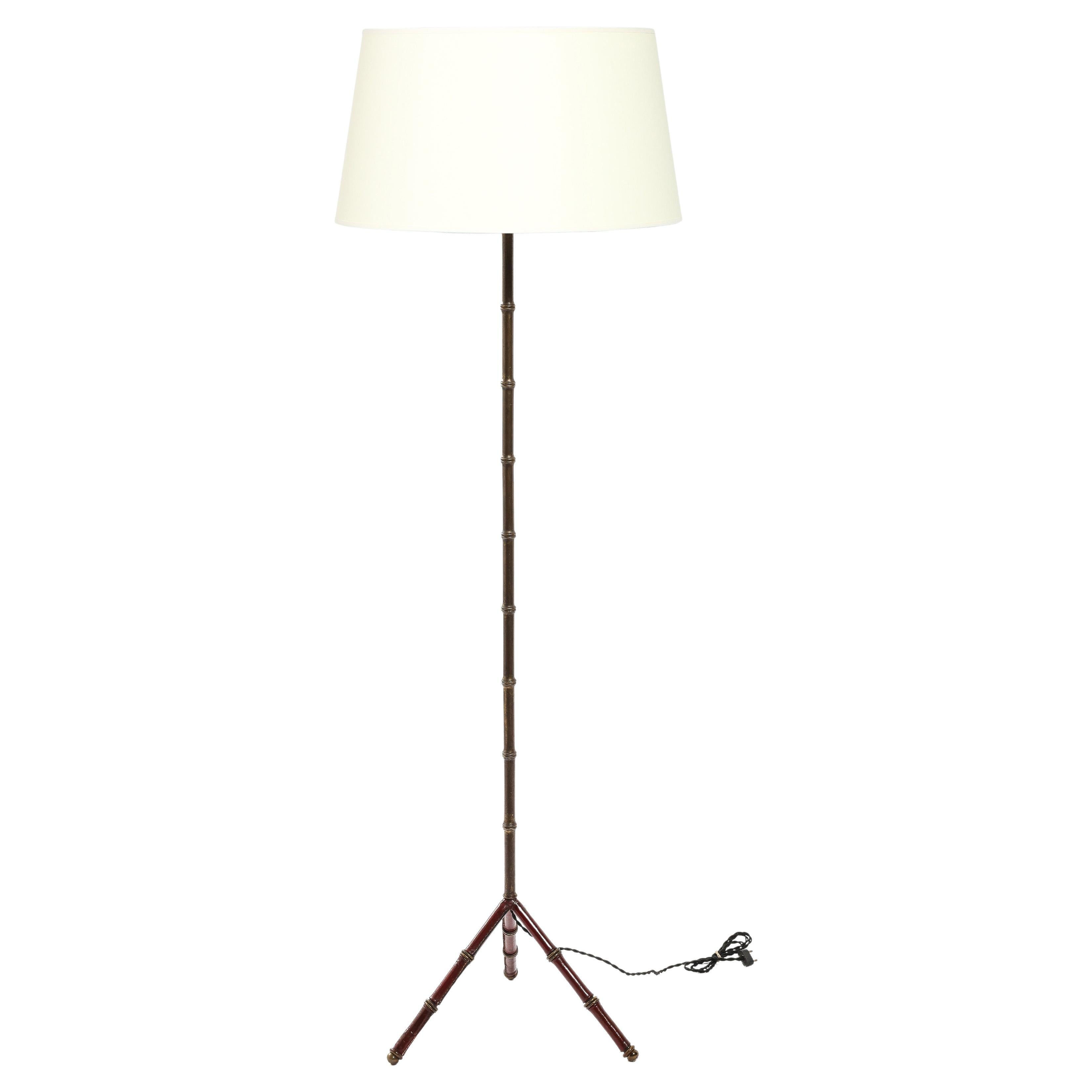 Red Leather & Brass Faux Bamboo Jacques Adnet Floor lamp, France 1950's
