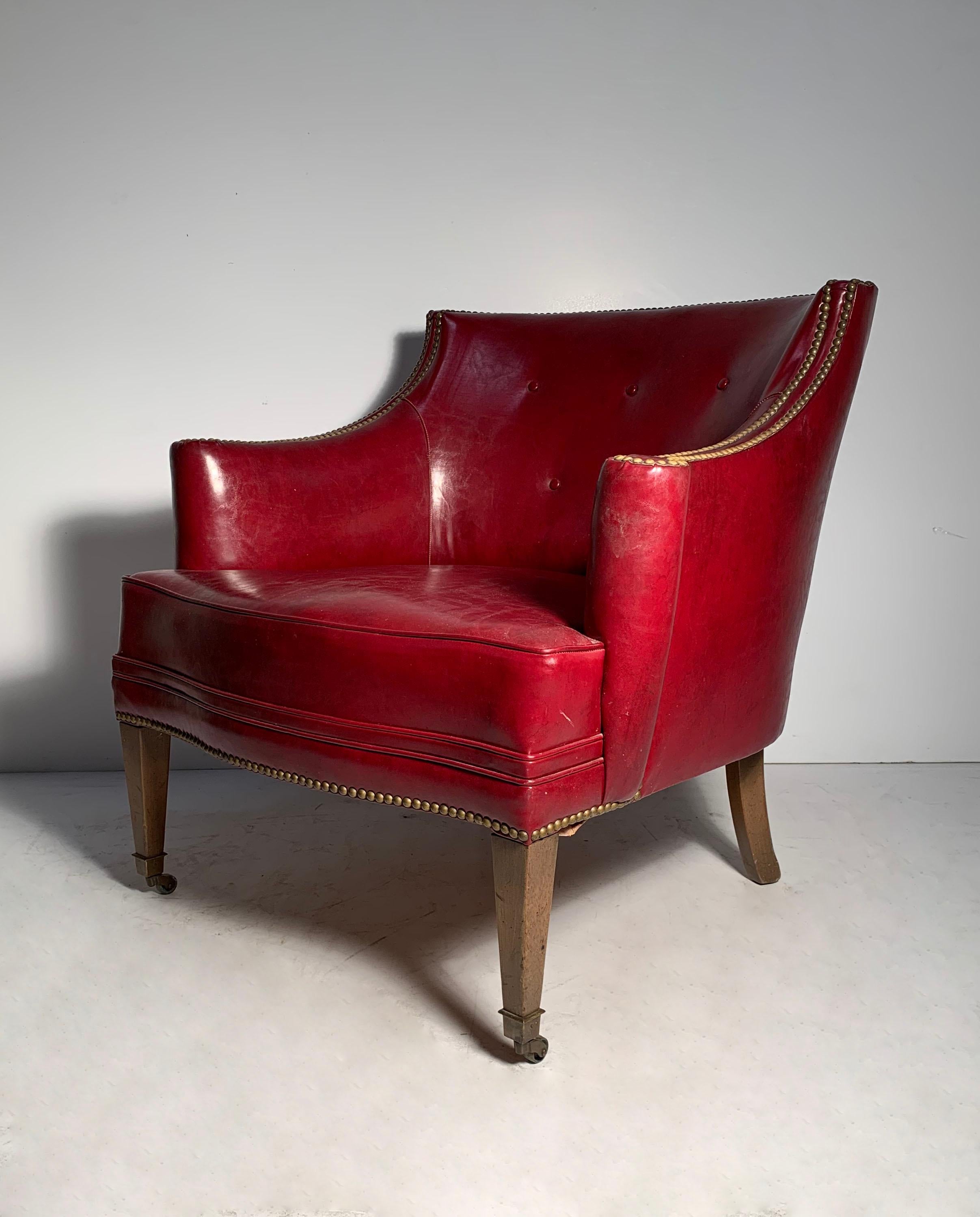 red leather barrel chair