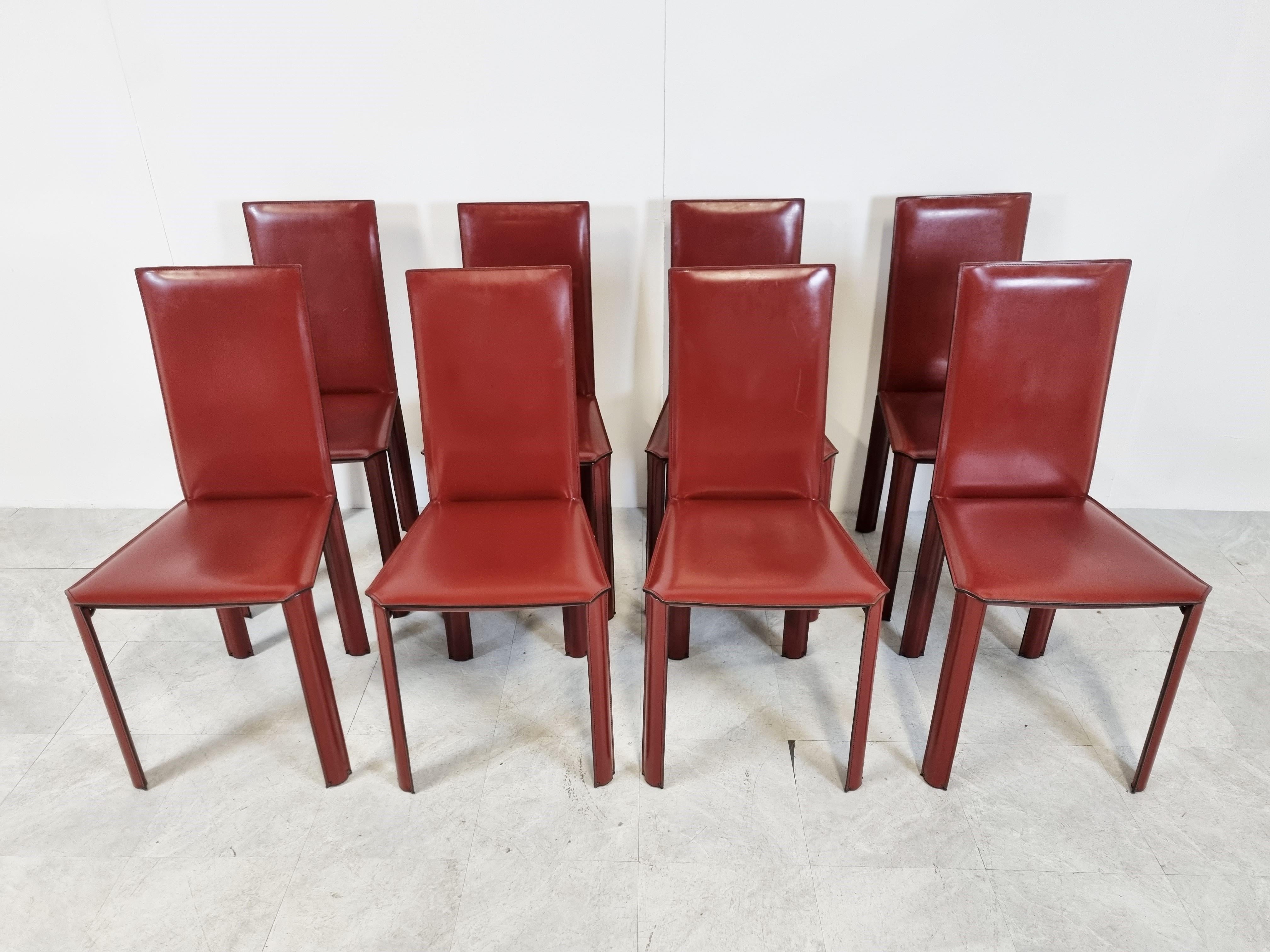 Vintage red leather dining chairs by Decouro Brazil. 

These high quality dining chairs have a timeless design and are made of strong leather.

They resemble a lot like the Cab dining chairs still produced by Cassina today. 

1980s -
