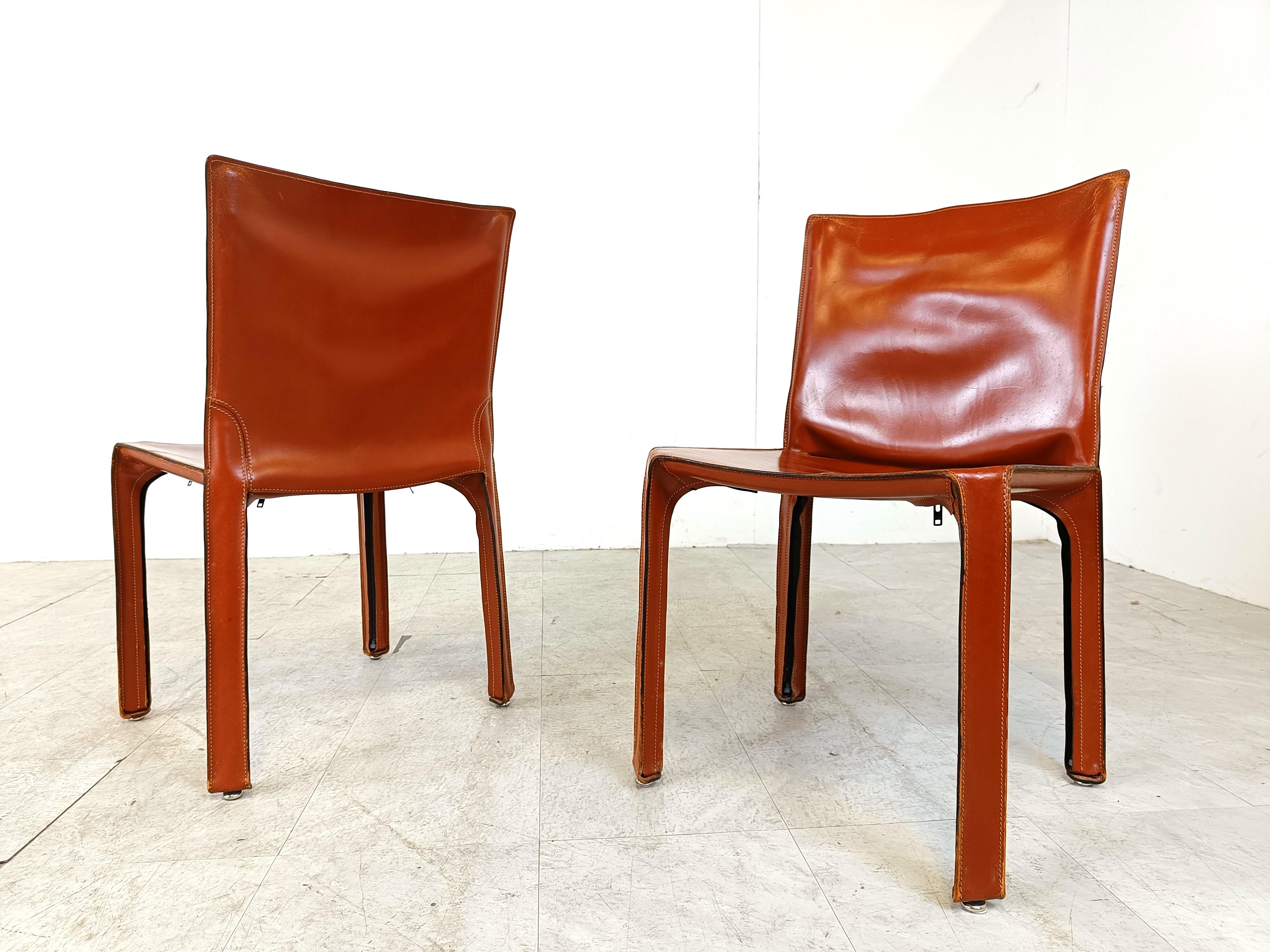 Set of 8 vintage red leather cab chairs designed by Mario Bellini for Cassina

1970s - Italy

Good condition with normal age related wear

The chairs original labels are gone but there are still spots from where they use to hang, we can confirm
