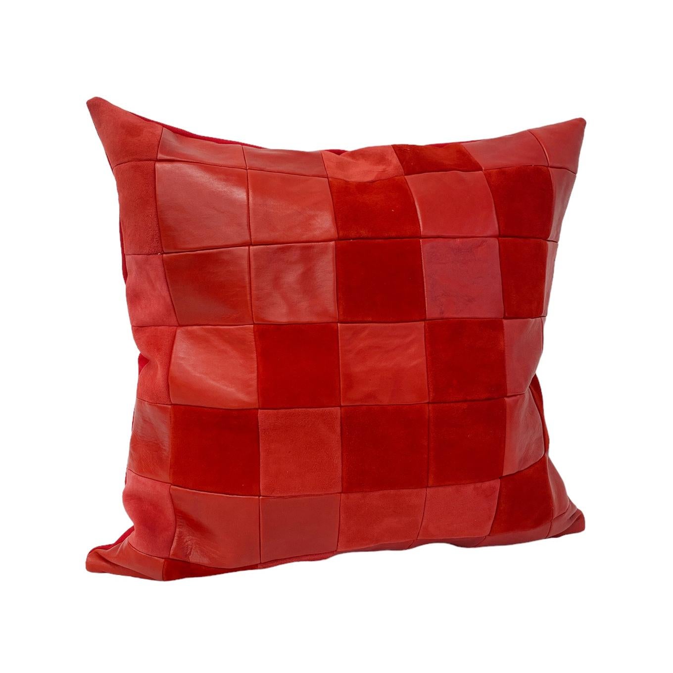 Red Leather Home Decorative  Throw Pillow
A graphic tessellation of deep-toned reds in buttery leather and softest suede.  Modern warmth and richness that gives as much pleasure to the eye as it does to the touch. 