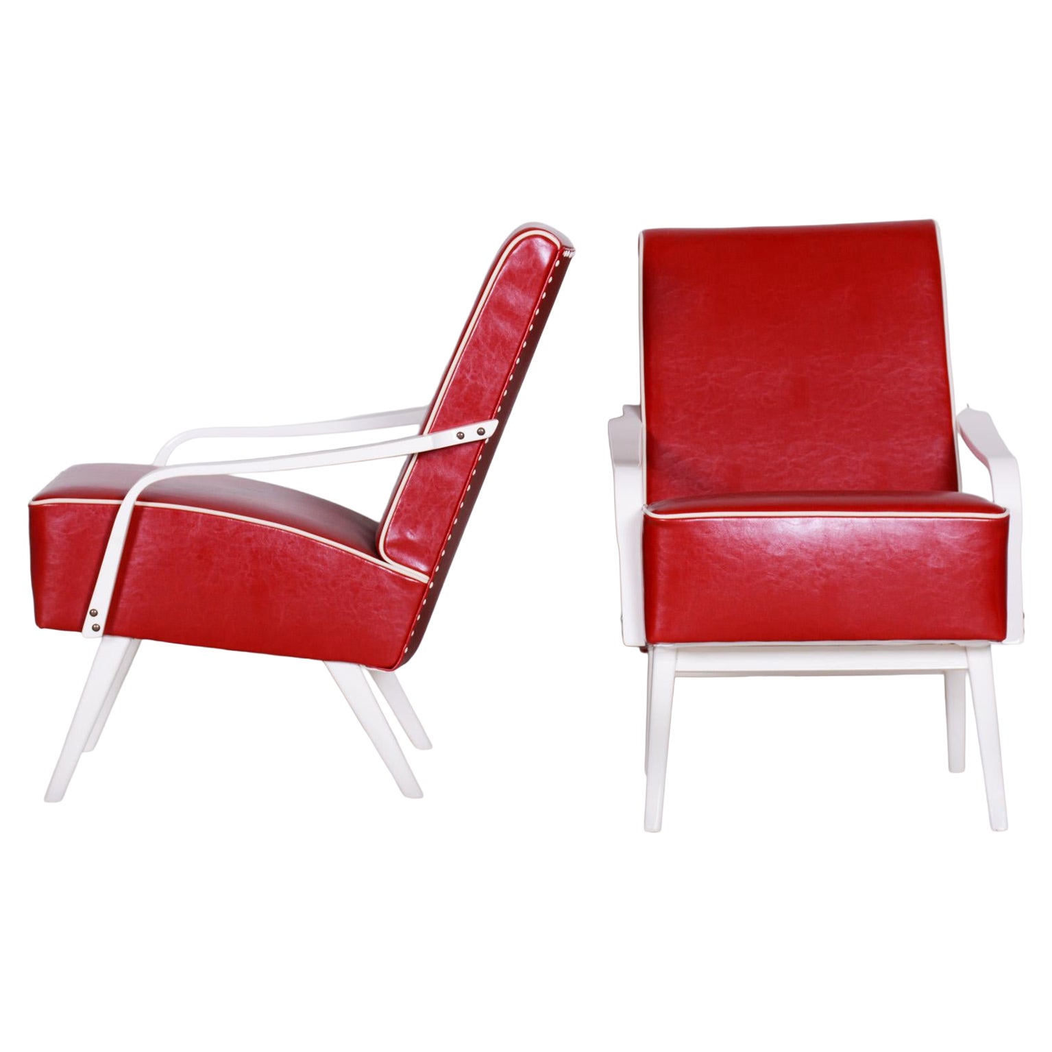 Red Leather mid Century Armchairs made in 1950s Czechia. Restored beech. For Sale