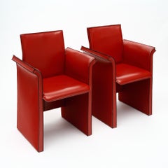 Red Leather Modernist Side Chairs by “Quia”