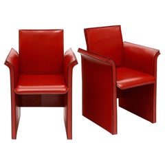 Red Leather Modernist Side Chairs by “Quia”
