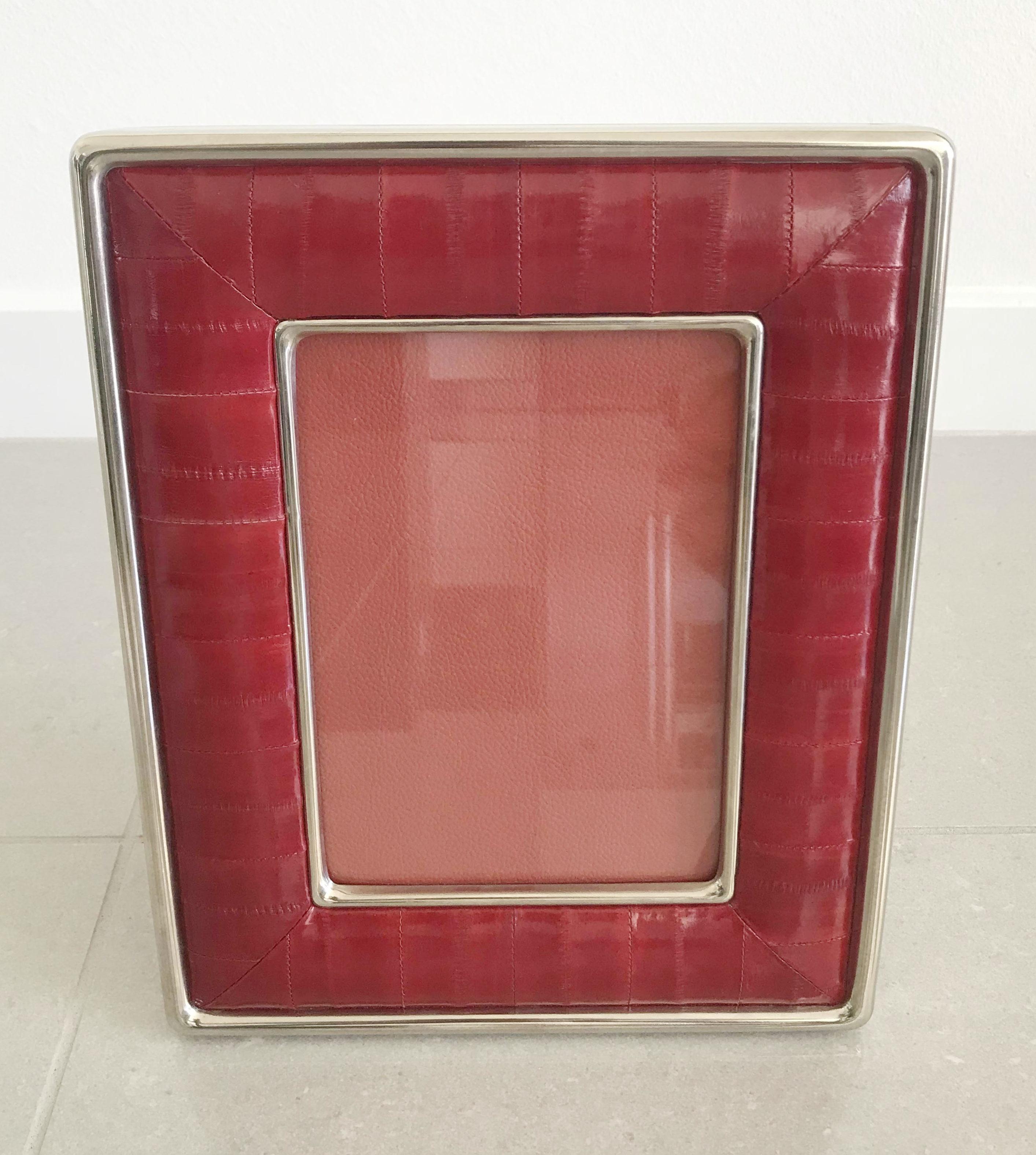 Red eel leather and nickel-plated picture frame by Fabio Ltd
Measures: Height 10.5 inches / width 8.5 inches / depth 1 inch
Photo size: 5 inches by 7 inches
LAST 1 in stock in Palm Springs ON 50% OFF SALE for $675 !!!
Order Reference #: FABIOLTD