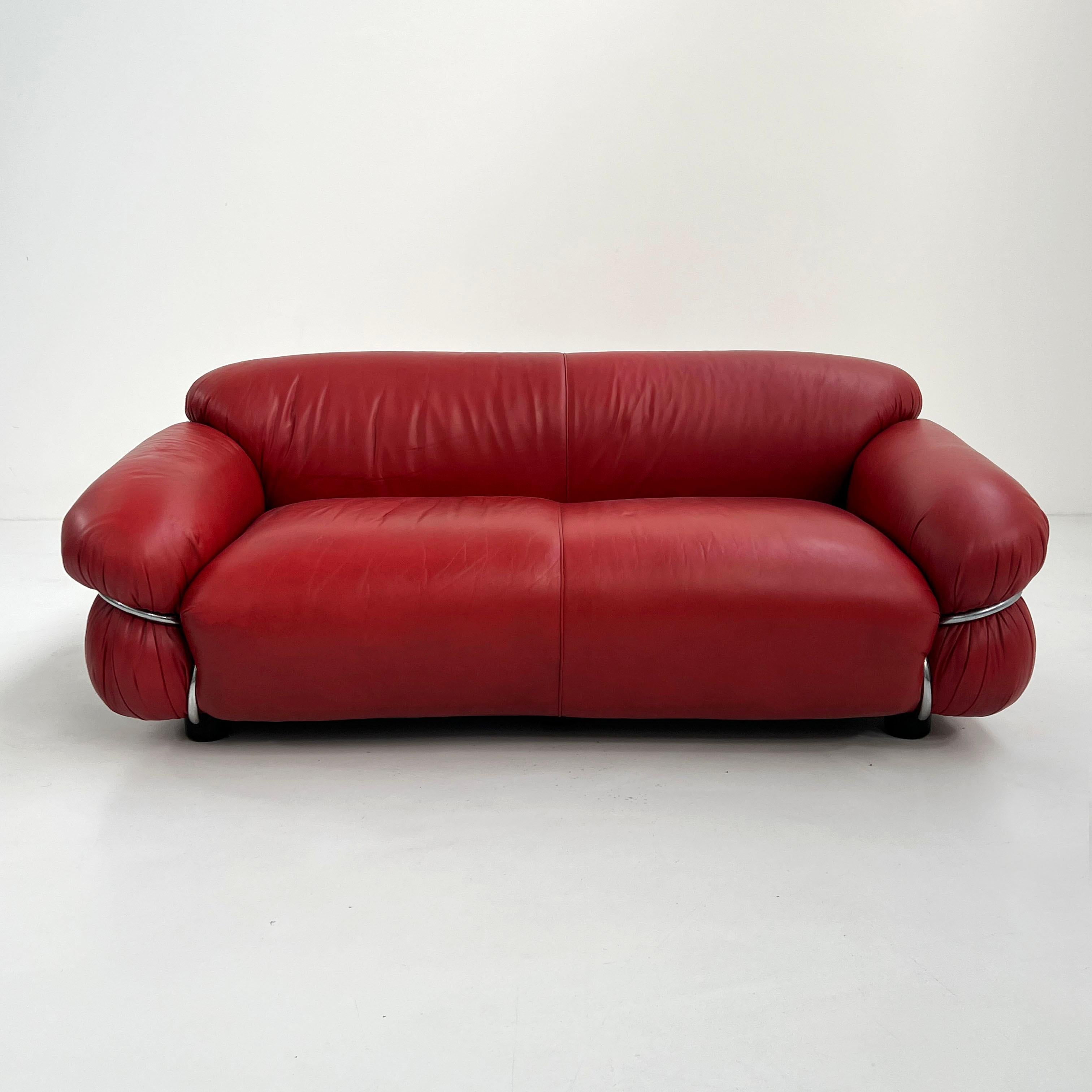Designer - Gianfranco Frattini
Producer - Cassina
Model - Sesann 2-seater Sofa
Design Period - Seventies
Measurements - Width 180 cm x Depth 100 cm x Height 70 cm x Seat Height 40 cm
Materials - Leather, Metal, Chrome Plating
Color - Red,