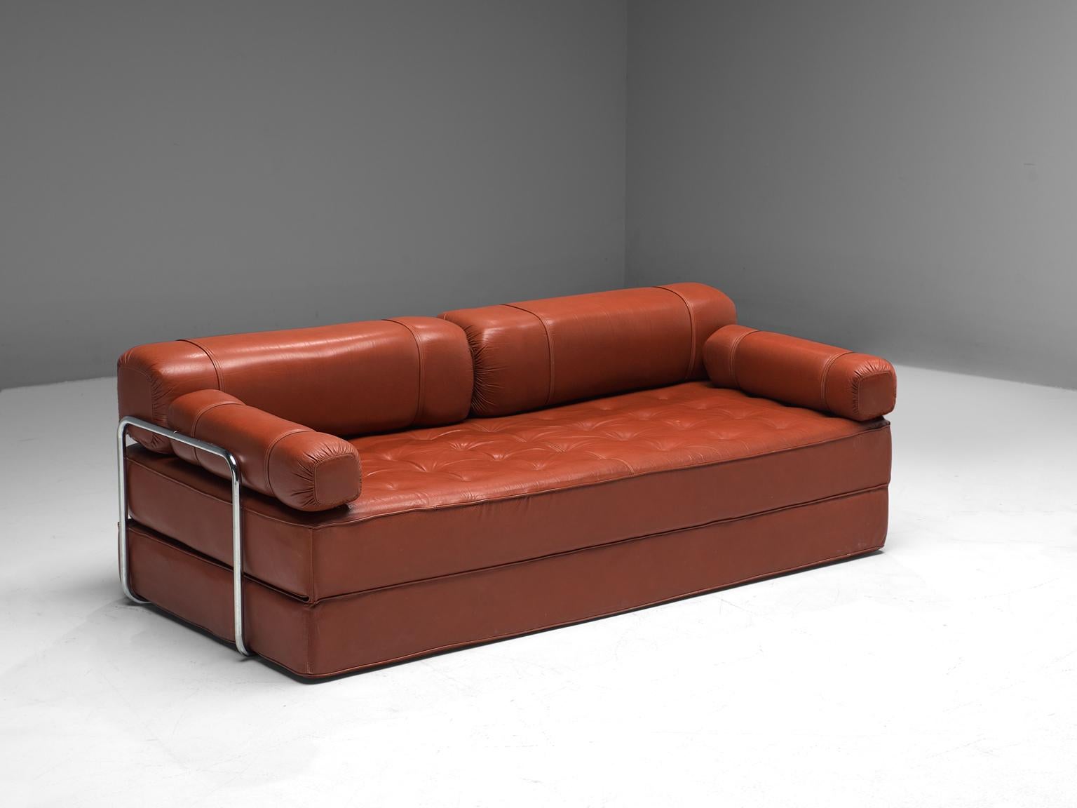 Sofa daybed, leather and chromed metal, Europe, 1970s.

This postmodern sofa is a versatile piece, since it can be unfolded into a bed as well. The seat consists of two mattress covered with beautiful dark red leather. The chromed tubular frame