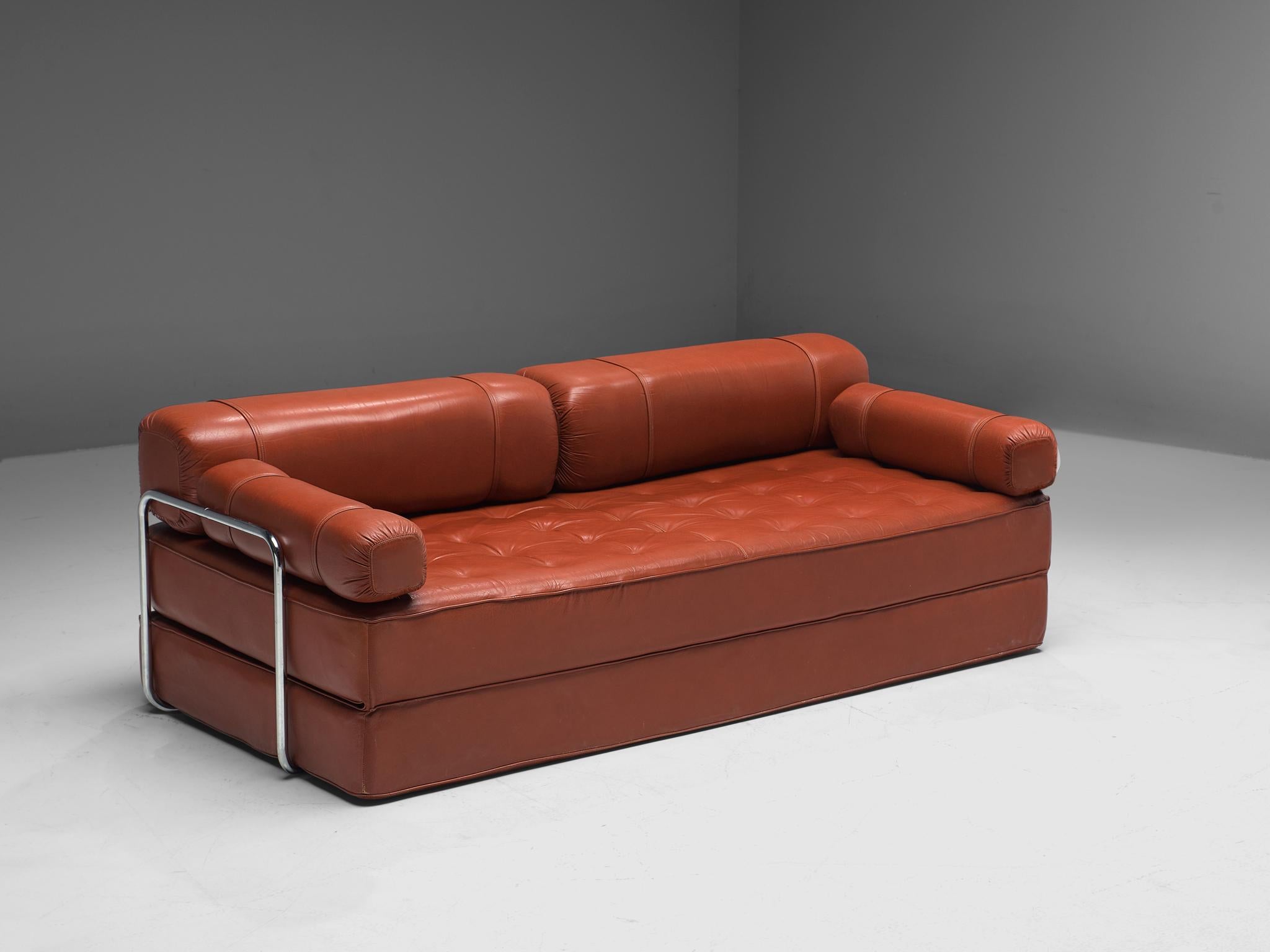 Sofa or fold out bed, leather and chromed metal, Europe, 1970s.

Lovely postmodern sofa in leather designed in Europe in the 1970s. This is a versatile piece, since it can easily be unfolded into a double bed as well. The seat consists of parts