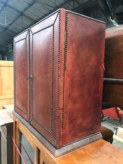 Red leather studded trunk