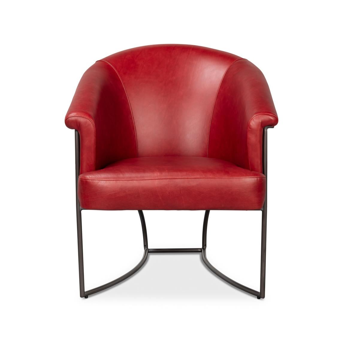 Upholstered in premium full-grain leather in Rouge red, this chair exudes sophistication and timeless style. The curved tub silhouette provides ergonomic comfort, while the sleek iron frame adds a contemporary edge and sturdy support.

Perfect for