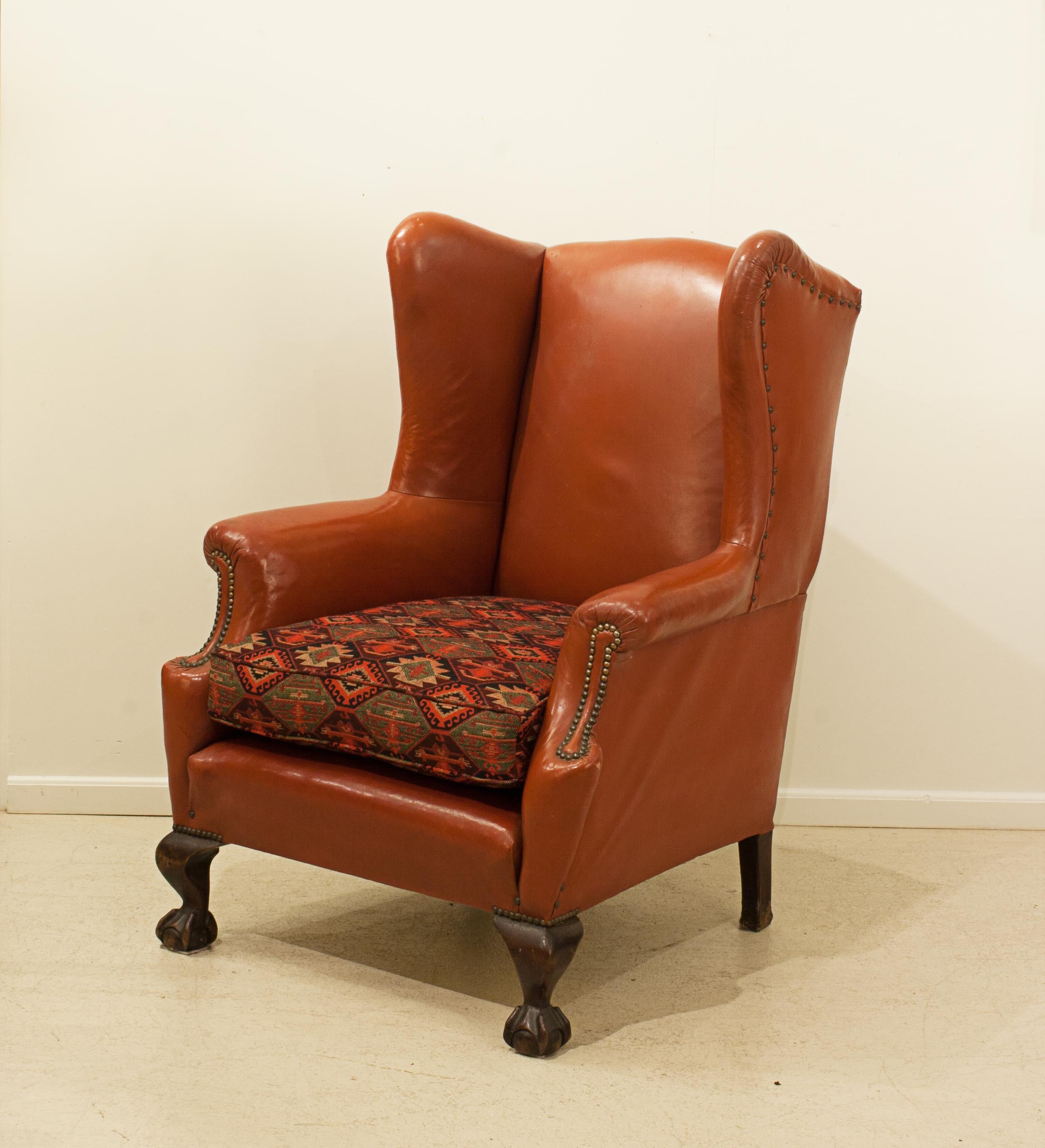 British Red Leather Wing Armchair For Sale
