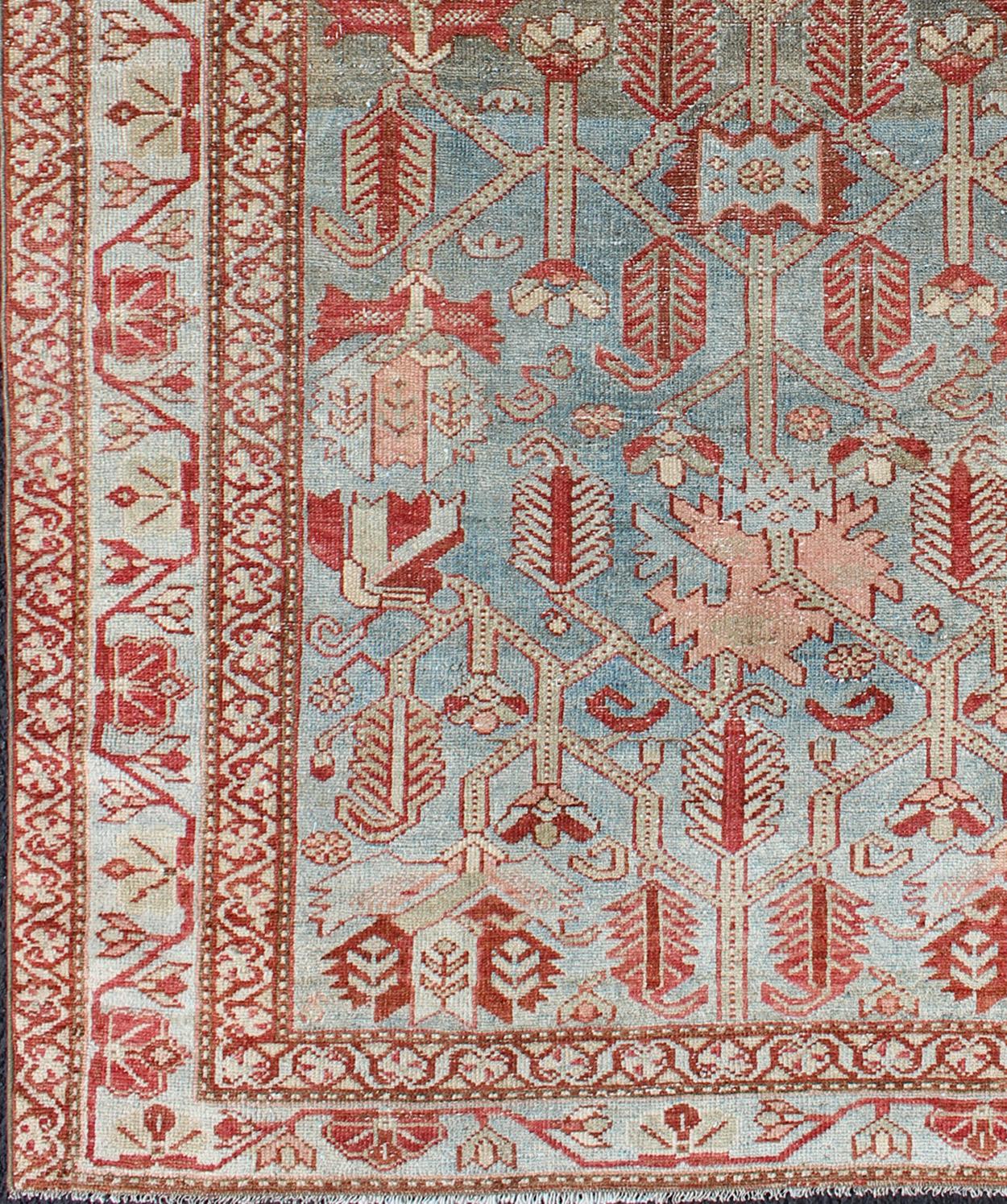 Energetic Persian Malayer antique rug with geometric motifs in shades of red and blue, rug en-176572, country of origin / type: Iran / Malayer, circa 1920.

This beautiful antique early 20th century Persian Malayer carpet features an all-over