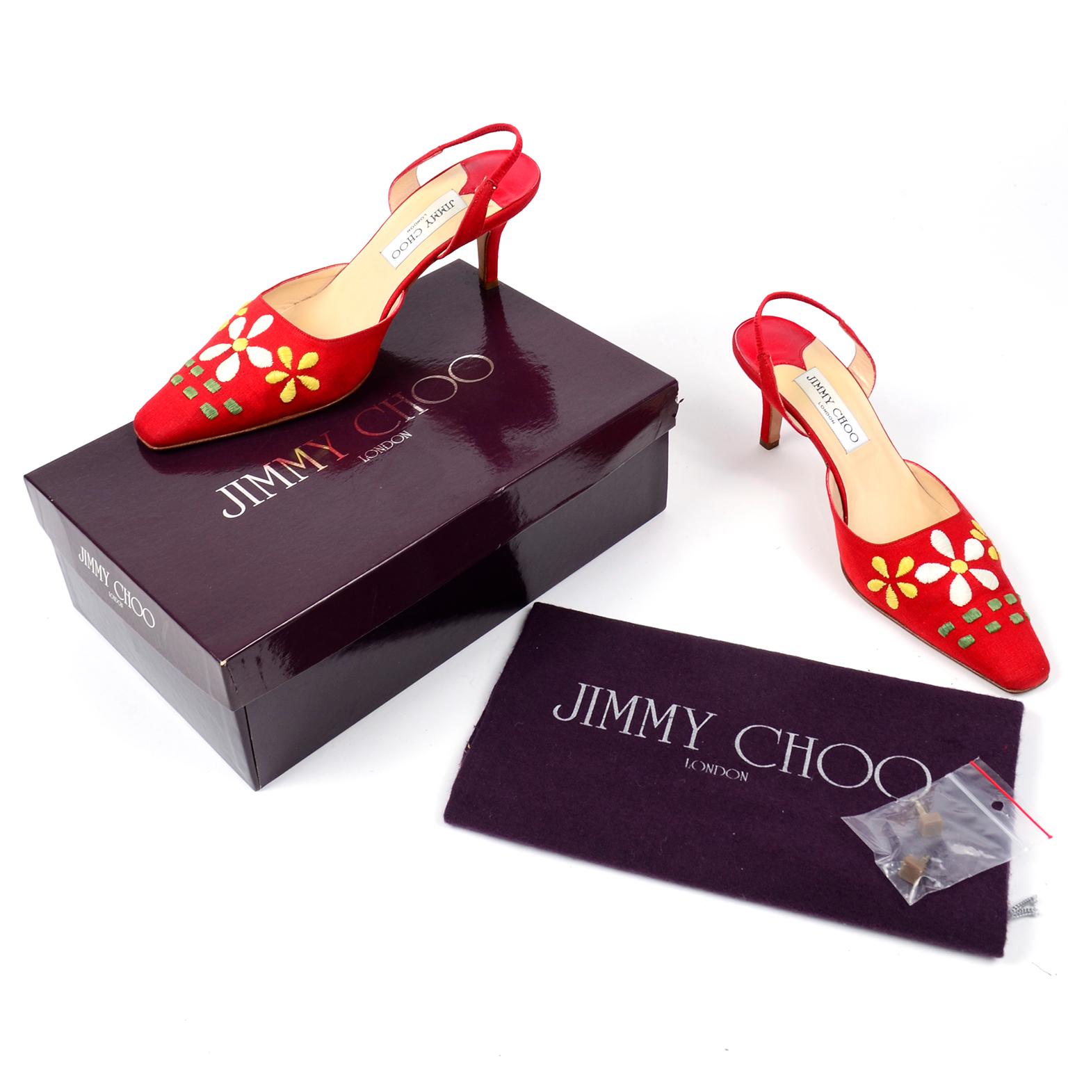 These are such fun Summer Jimmy Choo red linen slingback heel shoes with a slightly squared toe and large white and yellow daisies on the uppers. These shoes come with their original box, dust bag and extra heel tips. Marked size 37 and they fit on
