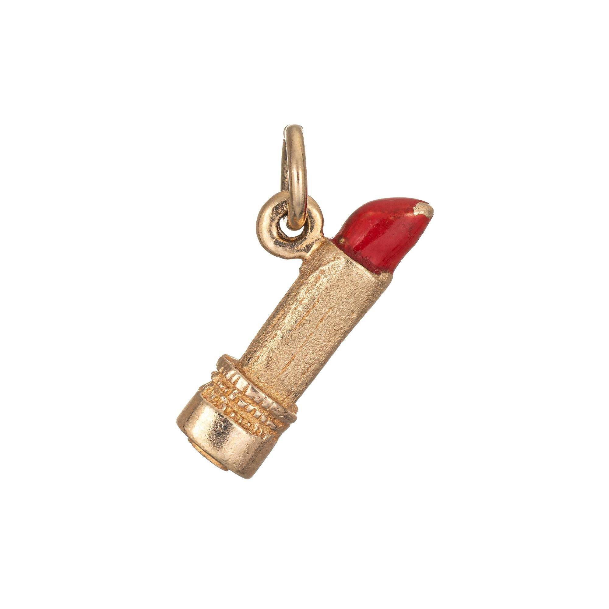 Finely detailed vintage red lipstick charm crafted in 14k yellow gold.  

The unique charm features lifelike detail of a tube of red lipstick rendered in enamel. The bale measures 3mm and can accommodate a thin to medium thickness chain if desired.