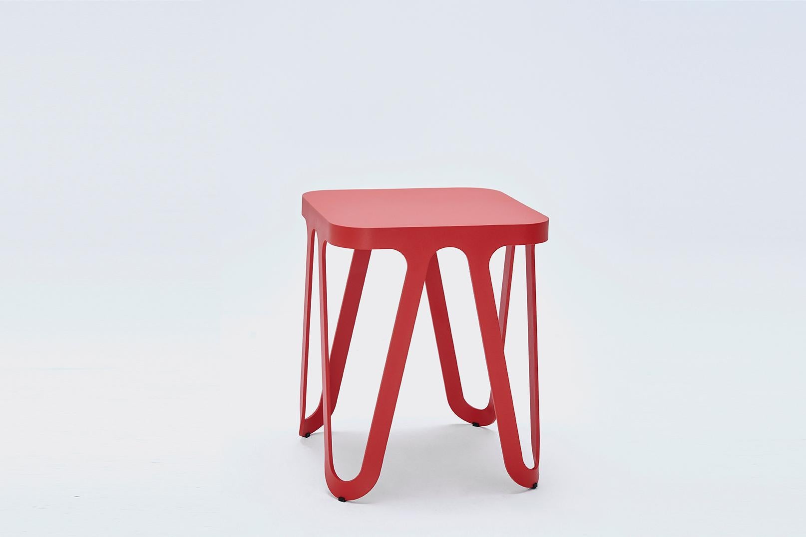Red loop stool by Sebastian Scherer
Dimensions: D38 x W38 x H44 cm
Material: Aluminium
Weight 3.5 kg
Also available in wood.
Also available in colours: snow white / light sand / sun yellow / clay orange / rust red / space blue / graphite grey /