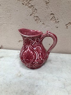 Brocca in maiolica rossa Onnaing, 1920 circa