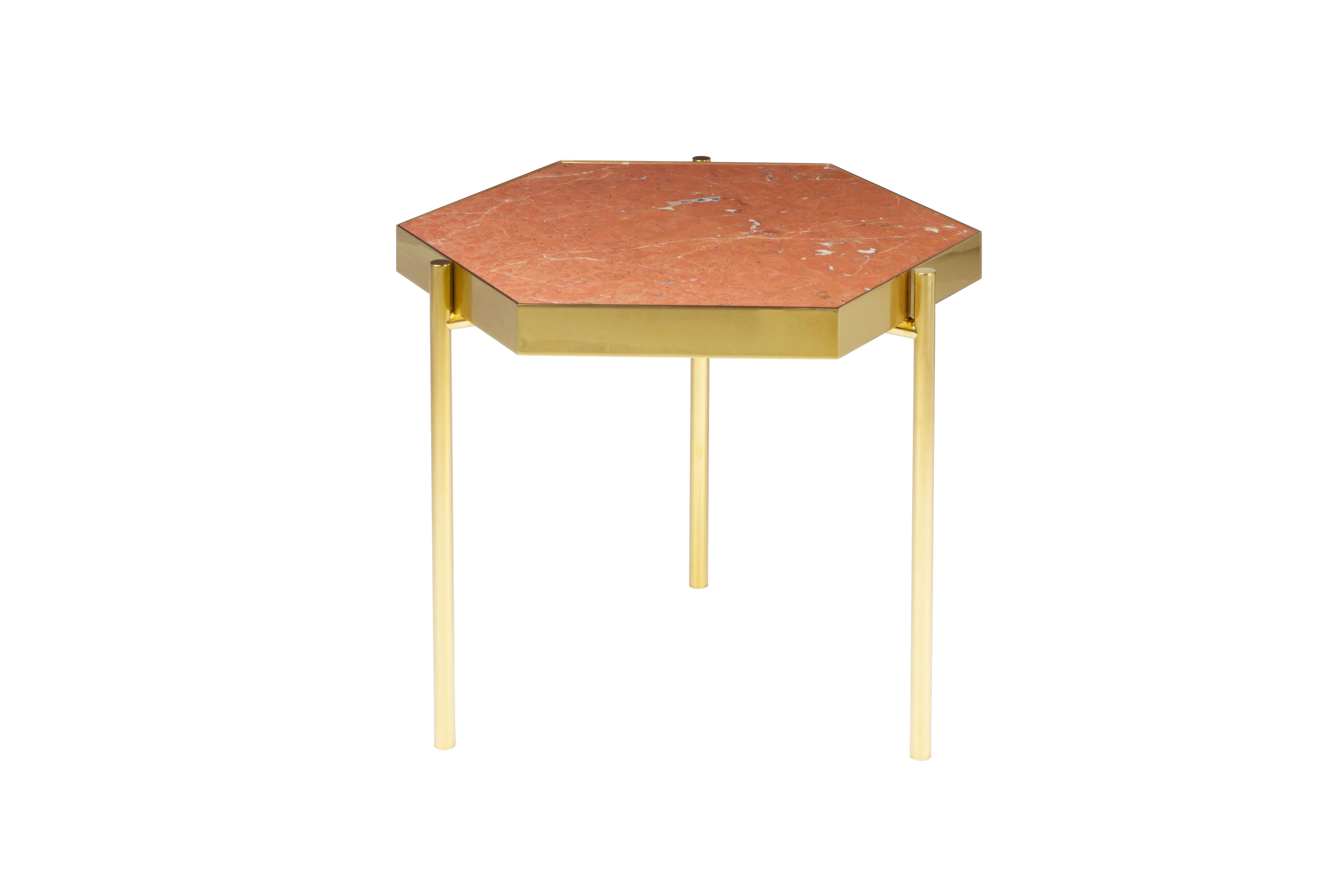 These simple, geometrically shaped table tops are inspired by the work of Wassily Kandinsky. It combines four different marble tops with two different structures. A full thin metal structure with titanium gold or stainless steel is available as well