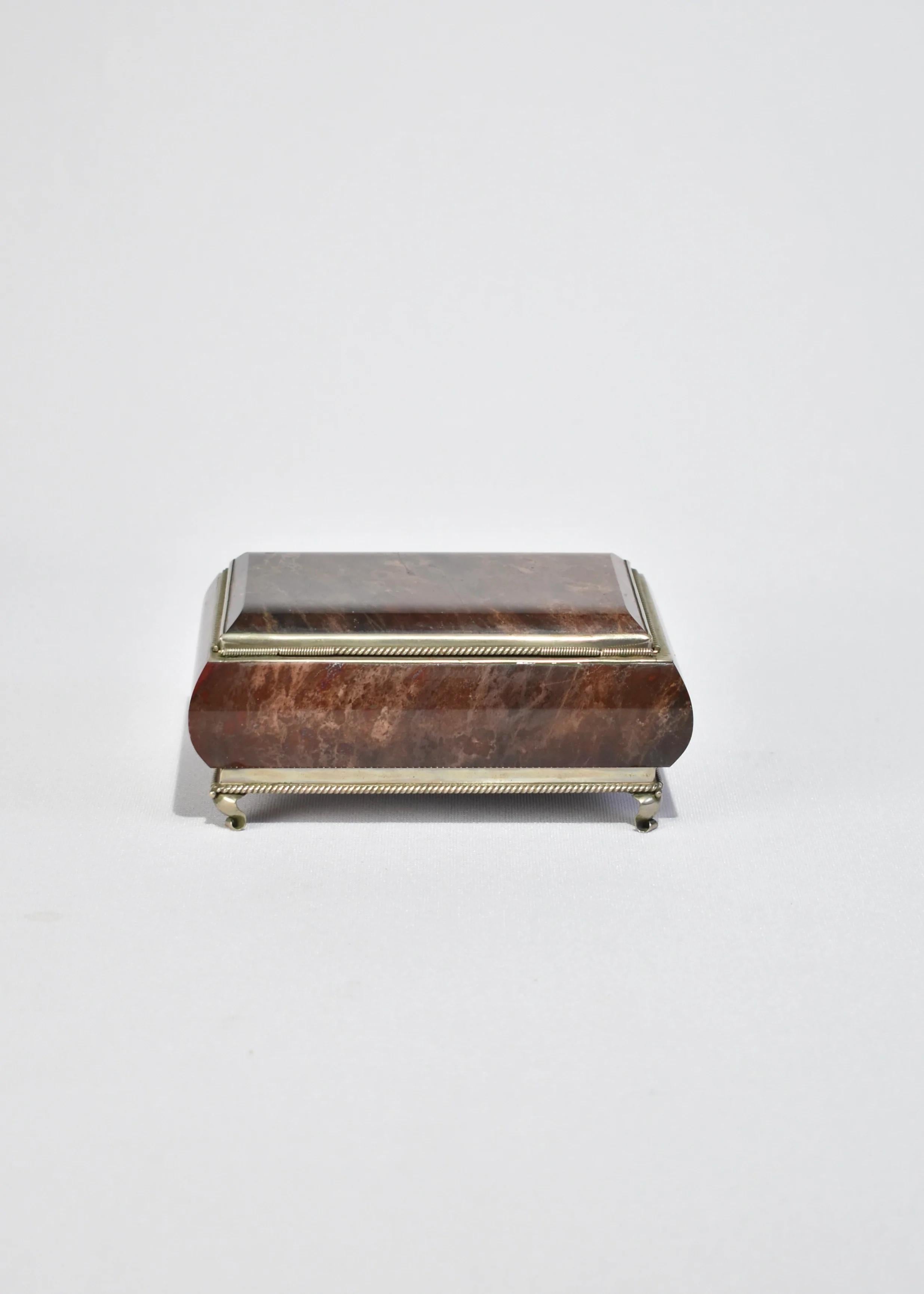 Stunning, deep red marble box with hinged lid and silver rope detailing.