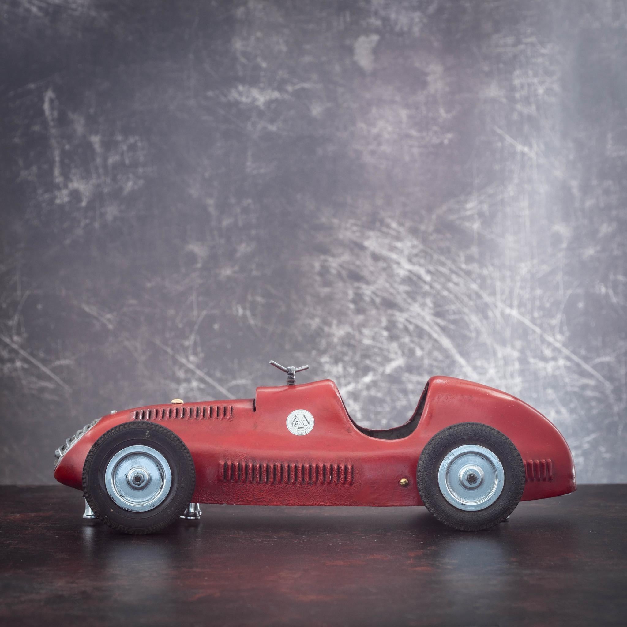 Fabulous scratch built model race car, circa 1952. A track car, such as this one, raced on the surface of a board track usually consisting of 4-6 lanes.

Constructed with an aluminium floor pan and skilfully crafted one piece sheet metal body that